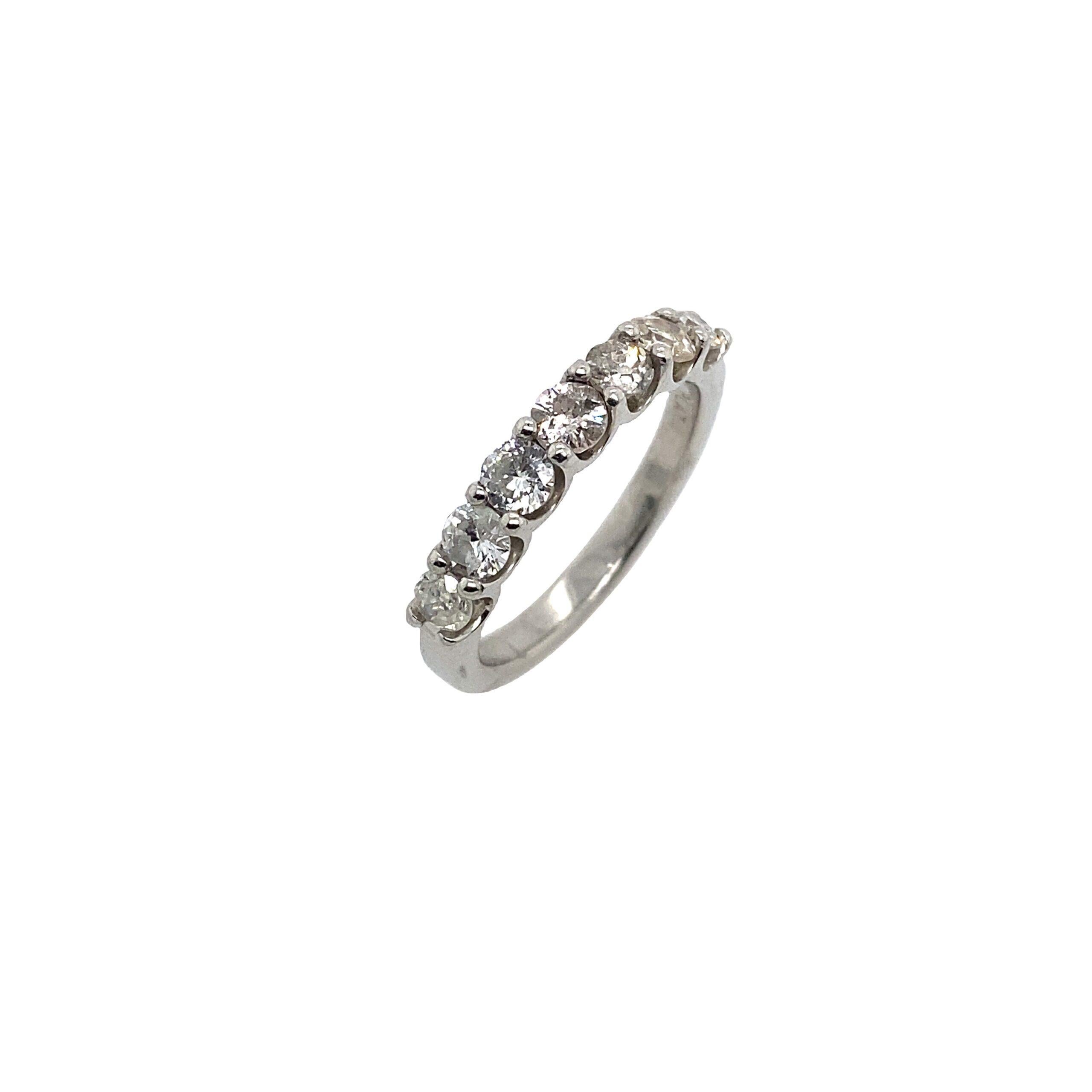 New Platinum 7 Stone Eternity Band Ring, Set With 1.20ct of Round Diamonds

Additional Information:
Total Diamond Weight: 1.02ct 
Diamond Colour: H/I
Diamond Clarity: SI
Total  Weight: 5.7g
Ring Size: M 1/2
Width of Band: 2.5mm
Width of Head: