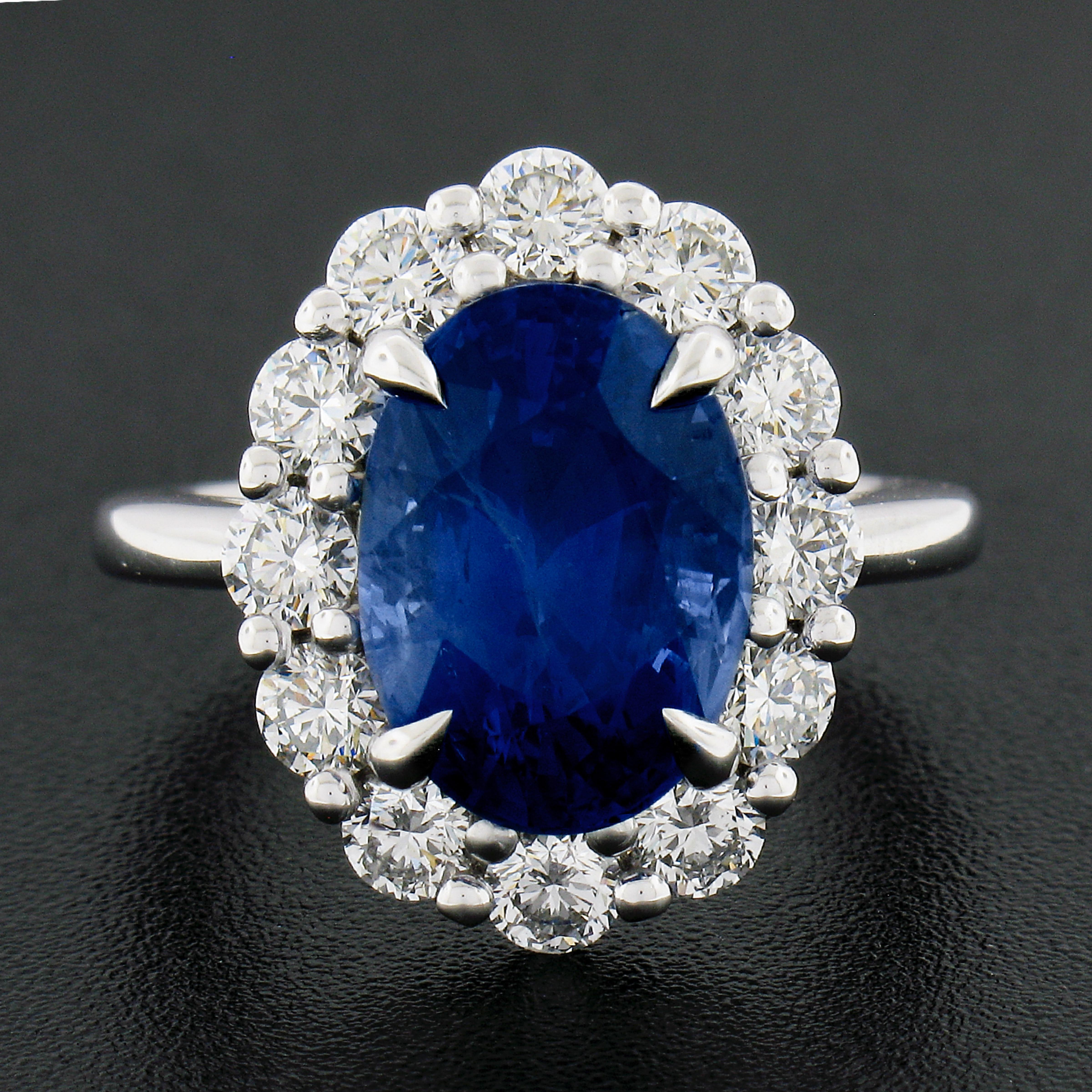 Oval Cut New Platinum 8.27ctw GIA Ceylon No Heat Oval Blue Sapphire & Diamond Halo Ring For Sale
