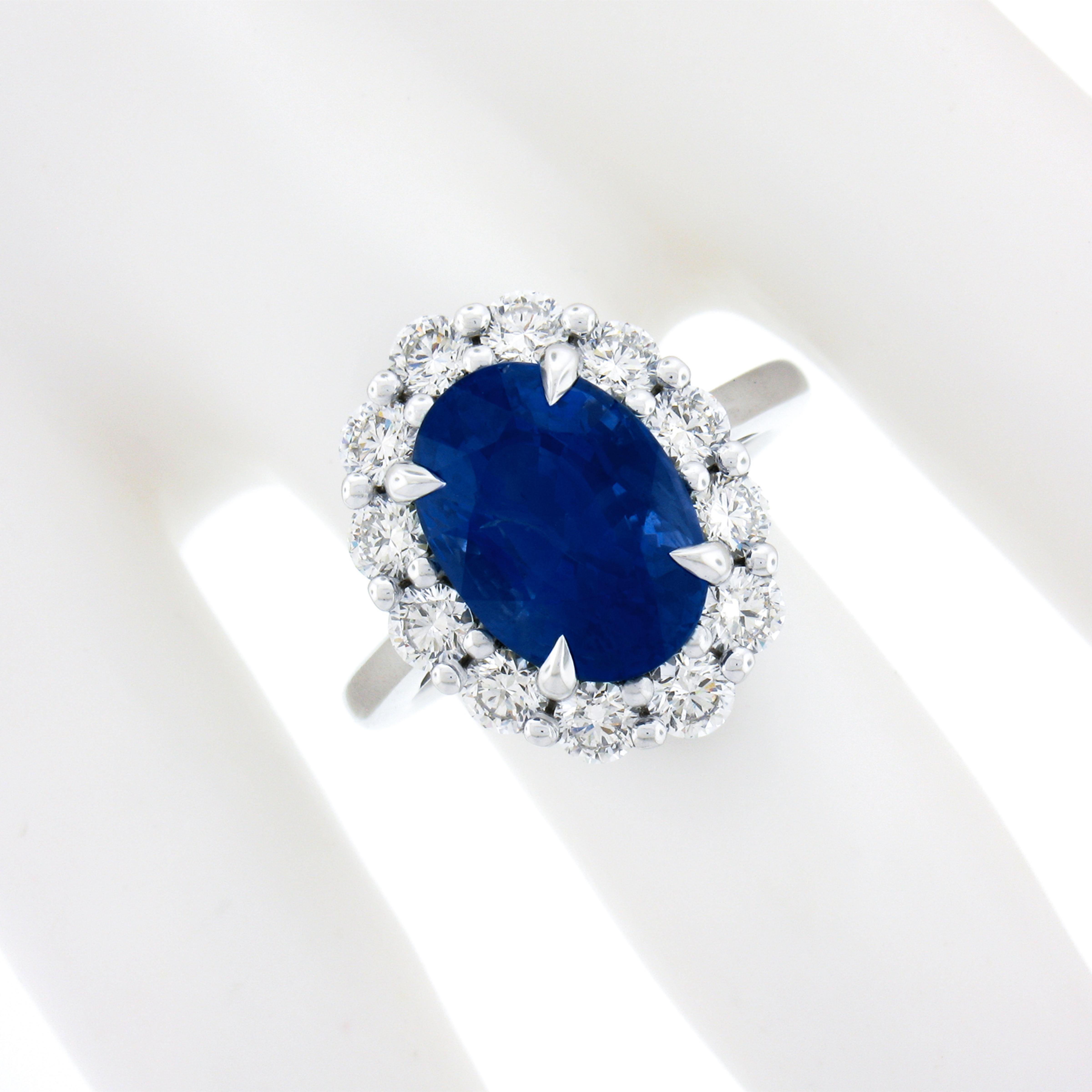 New Platinum 8.27ctw GIA Ceylon No Heat Oval Blue Sapphire & Diamond Halo Ring In New Condition For Sale In Montclair, NJ