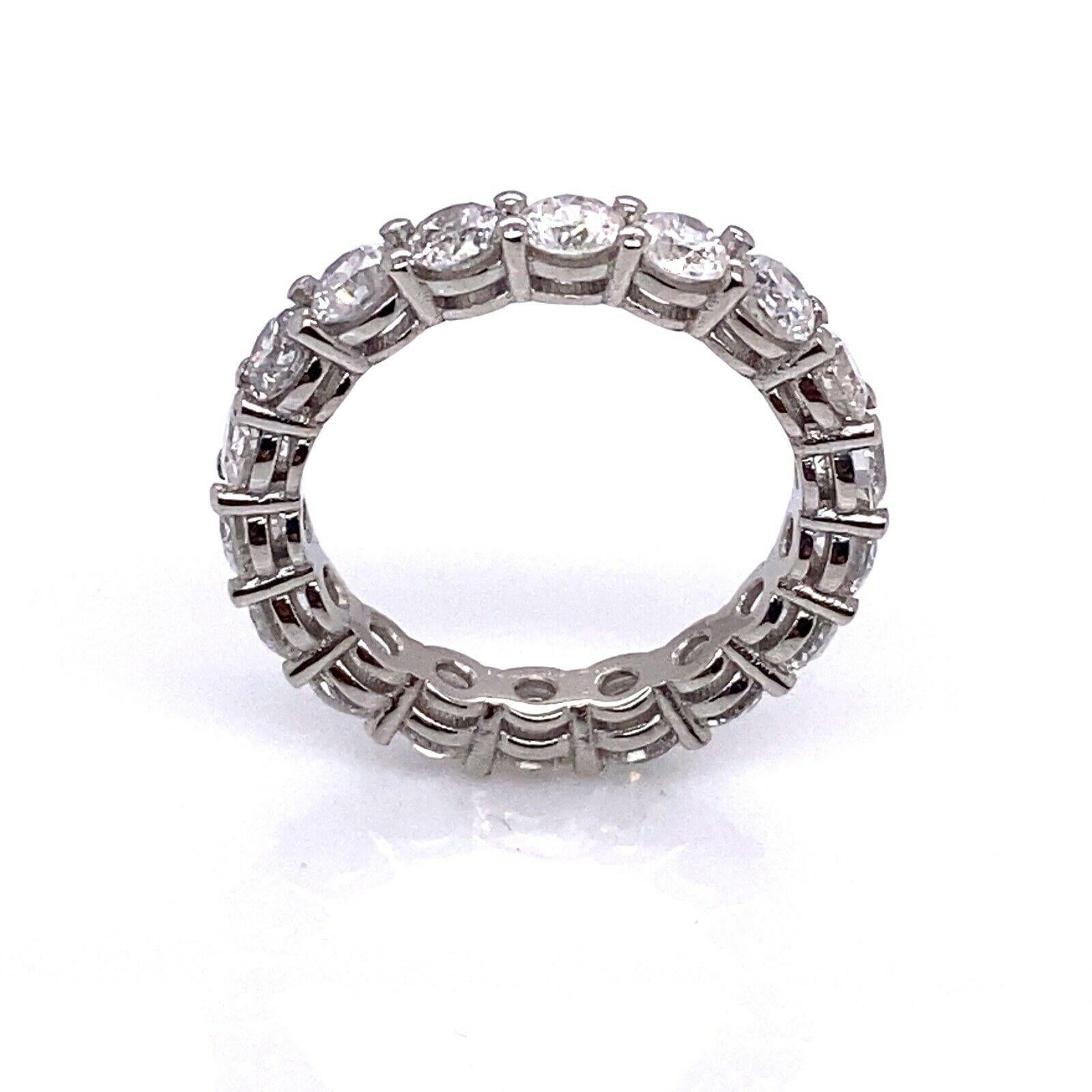 New Platinum Full Eternity Band Ring, Set With 3.0ct Of Round DiamondsMade by Jewellery Cave

Additional Information:
Total Diamond Weight: 3.0ct 
Diamond Colour: G/H
Diamond Clarity: SI2/3
Total  Weight: 5.4g
Ring Size: N
Width of Band: