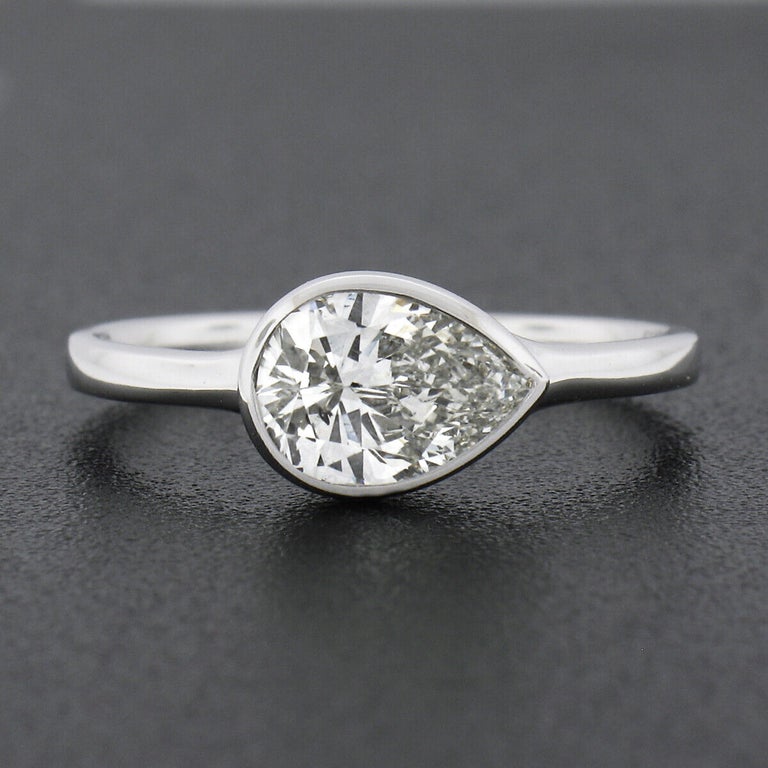 Pear Cut New Platinum GIA 1.06ctw Pear Sideways Bezel Diamond Solitaire Engagement Ring For Sale