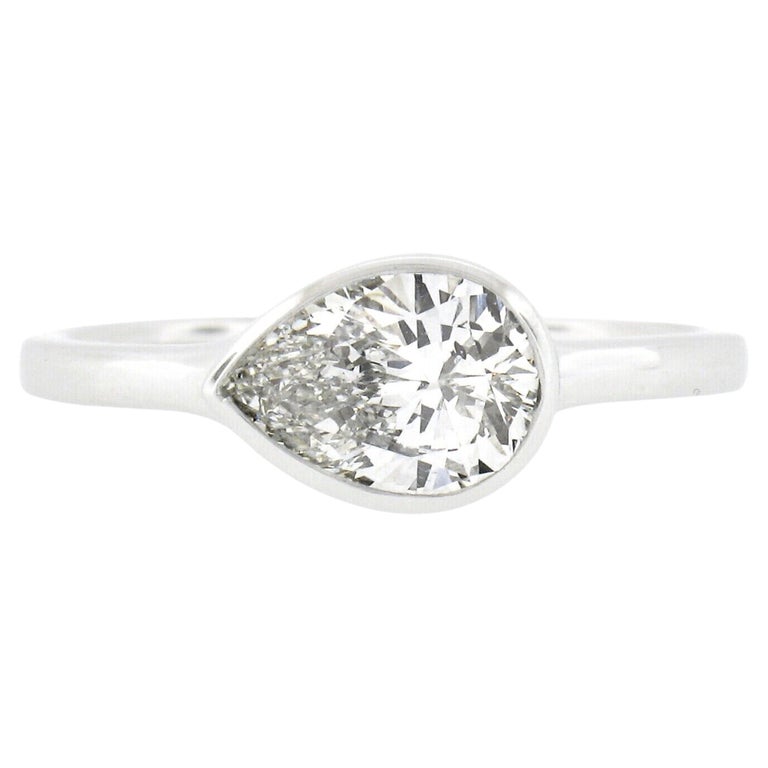 New Platinum GIA 1.06ctw Pear Sideways Bezel Diamond Solitaire Engagement Ring For Sale