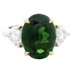 Bague en or et platine, tourmaline verte chromée ovale 5,59 carats certifiée GIA et diamant cœur