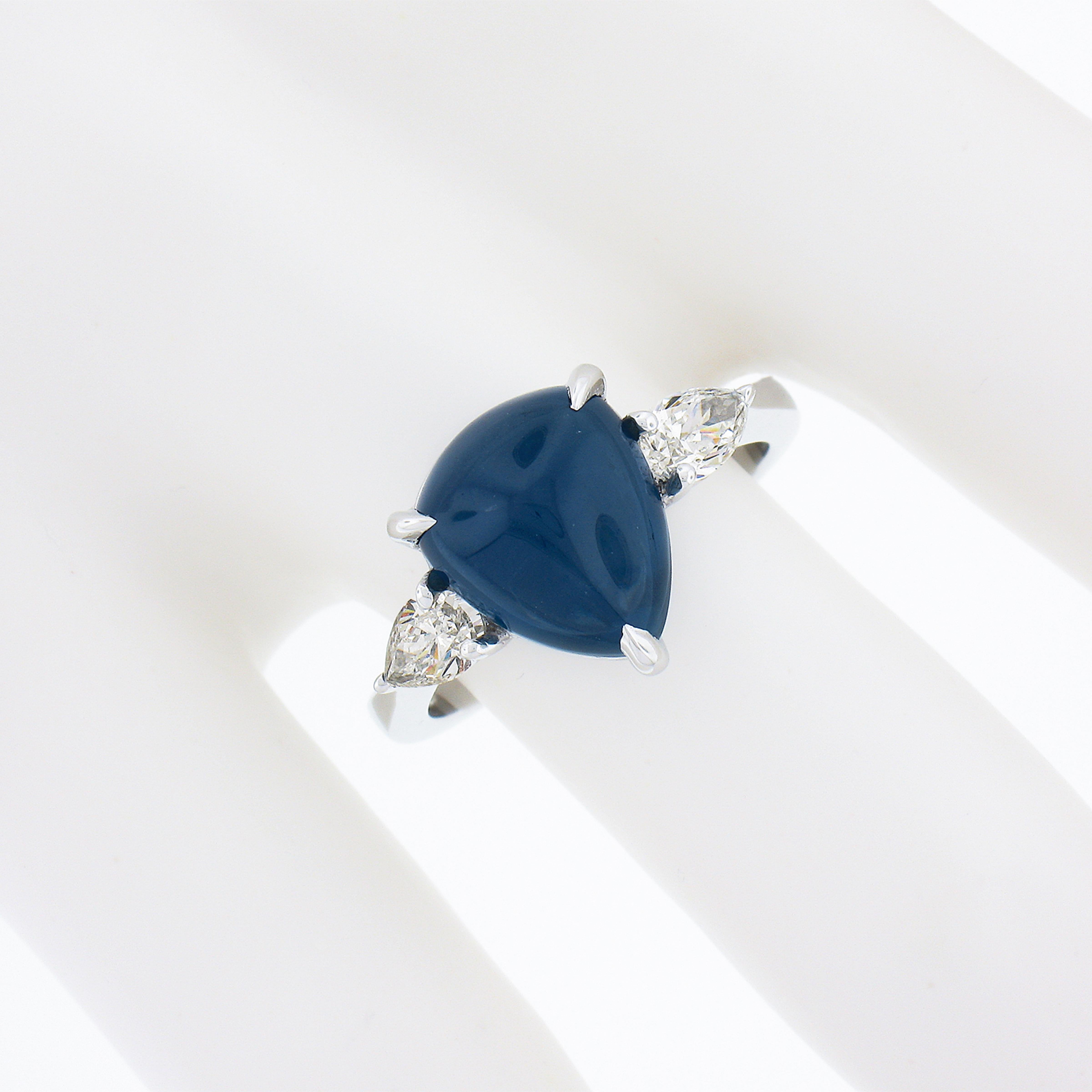 New Platinum Gubelin 5.63ct Triangle Cabochon Sapphire Pear Diamond 3 Stone Ring In New Condition For Sale In Montclair, NJ