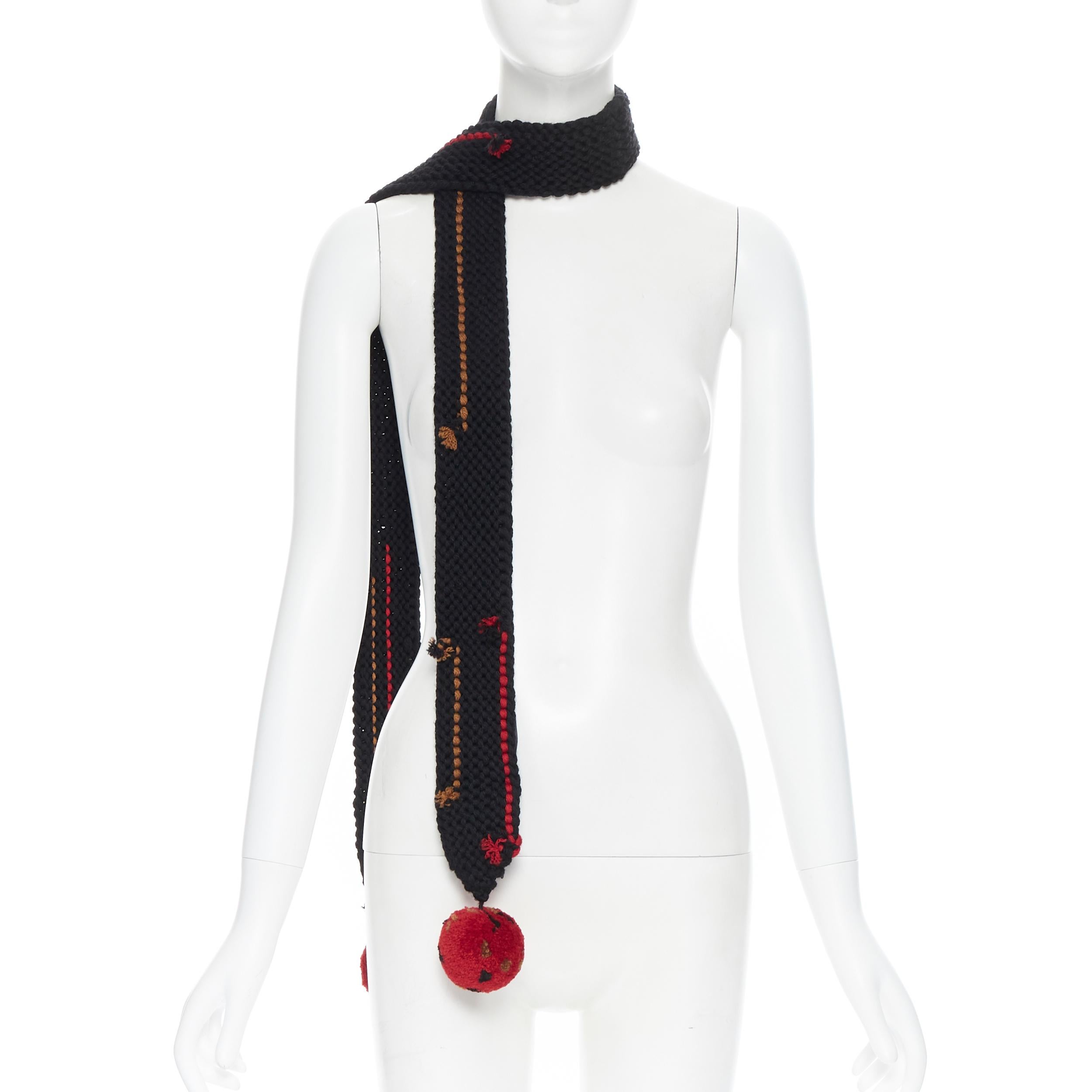 new PRADA 2017 Runway Hand Made black crochet knit pom trim skinny long scarf
Brand: Prada
Designer: Miuccia Prada
Collection: Fall Winter 2017
Model Name / Style: Knitted scarf
Material: Wool
Color: Black, red
Pattern: Solid
Extra Detail: From Fall