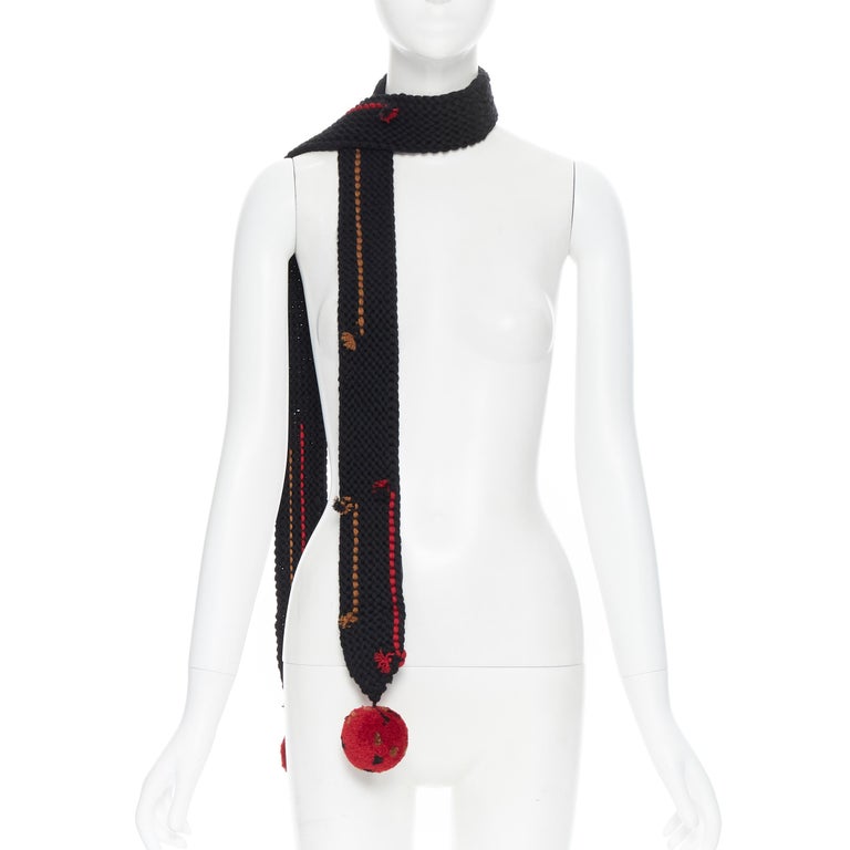 
new PRADA 2017 Runway Hand Made black crochet knit red pom skinny long scarf
Brand: Prada
Designer: Miuccia Prada
Collection: Fall Winter 2017
Model Name / Style: Knitted scarf
Material: Wool
Color: Black, red
Pattern: Solid
Extra Detail: From Fall