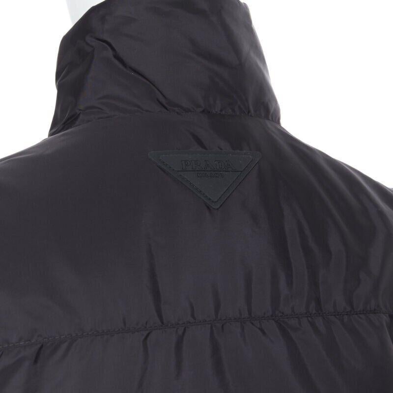 new PRADA 2018 black nylon triangle rubber logo detail padded jacket IT50 L
Reference: TGAS/A05740
Brand: Prada
Designer: Miuccia Prada
Collection: 2018
Material: Nylon
Color: Black
Pattern: Solid
Closure: Zip
Extra Details: Concealed button and zip