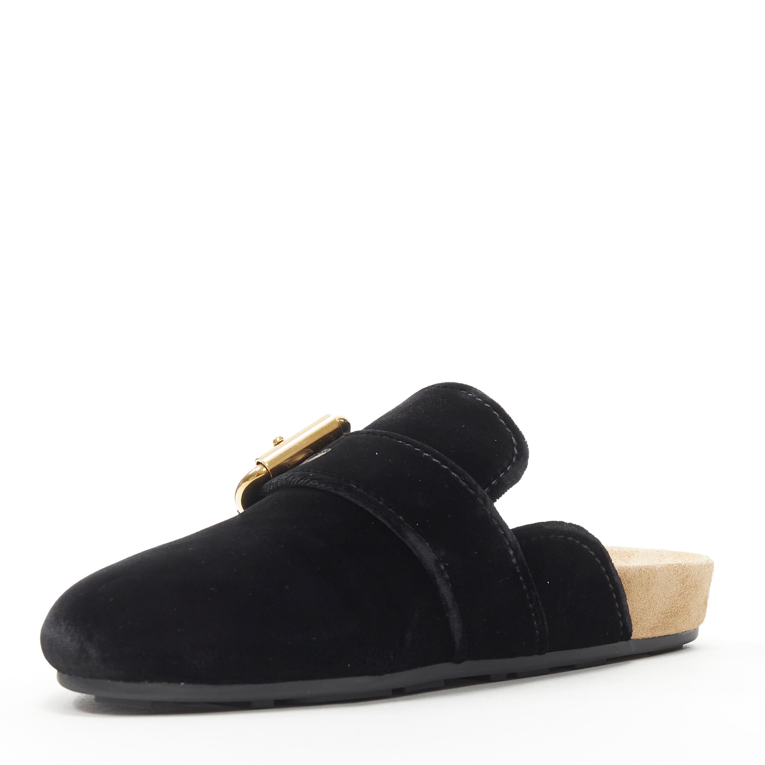 black mules with gold buckle