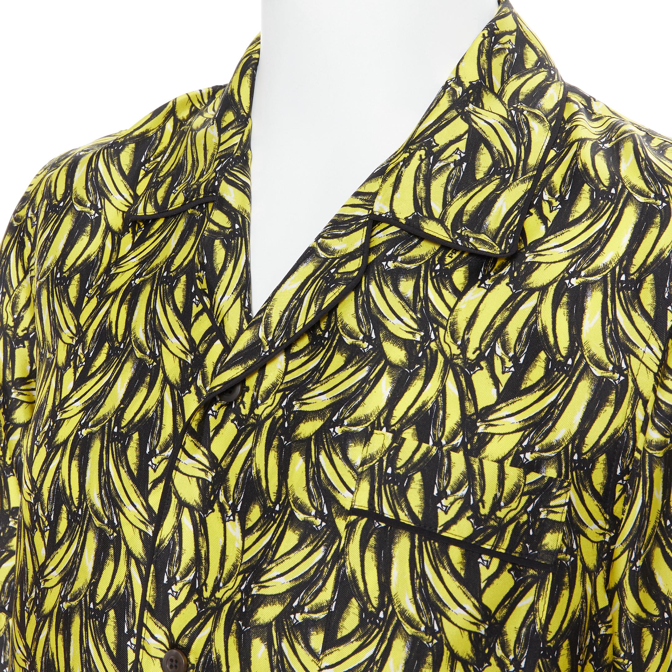 new PRADA 2018 iconic Banana yellow 100% silk short sleeve bowling shirt S 
Reference: TGAS/B00379 
Brand: Prada 
Designer: Miuccia Prada 
Collection: 2018 
Material: Silk 
Color: Yellow 
Pattern: Abstract 
Extra Detail: Black piping. 3 patch