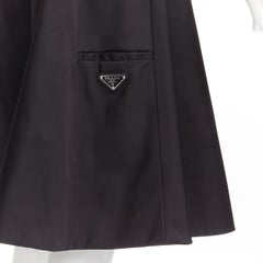 new PRADA 2019 black triangle logo seal plaque A-line flared skirt IT38 XS