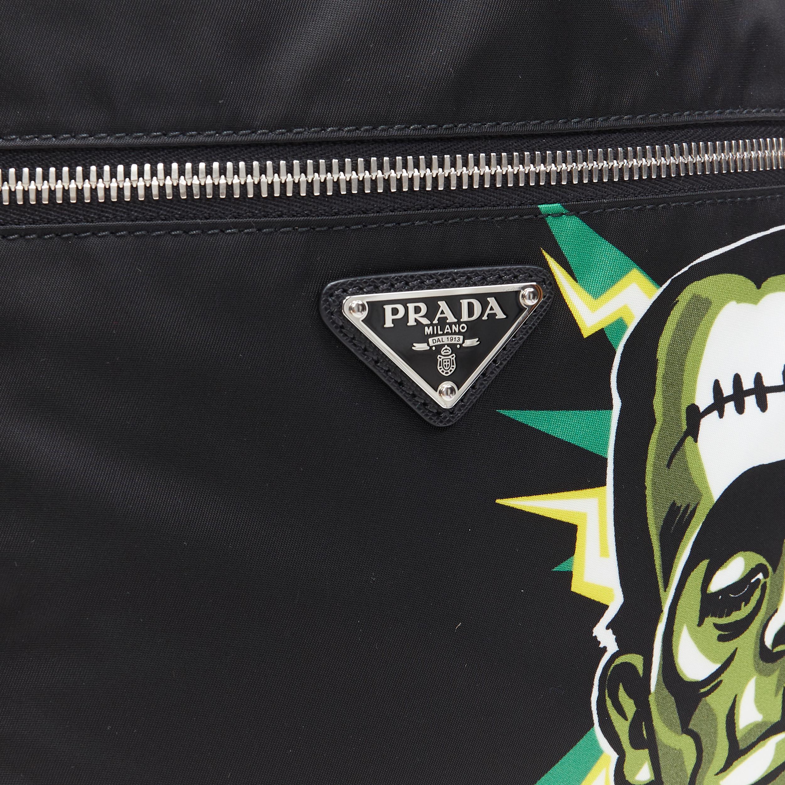 new PRADA 2019 Frankenstein black nylon logo plate drawstring backpack bag Reference: TGAS/A05792 Brand: Prada Designer: Miuccia Prada Model: Drawstring backpack Collection: Fall Winter 2019 Material: Nylon Color: Black Pattern: Solid Closure: Zip