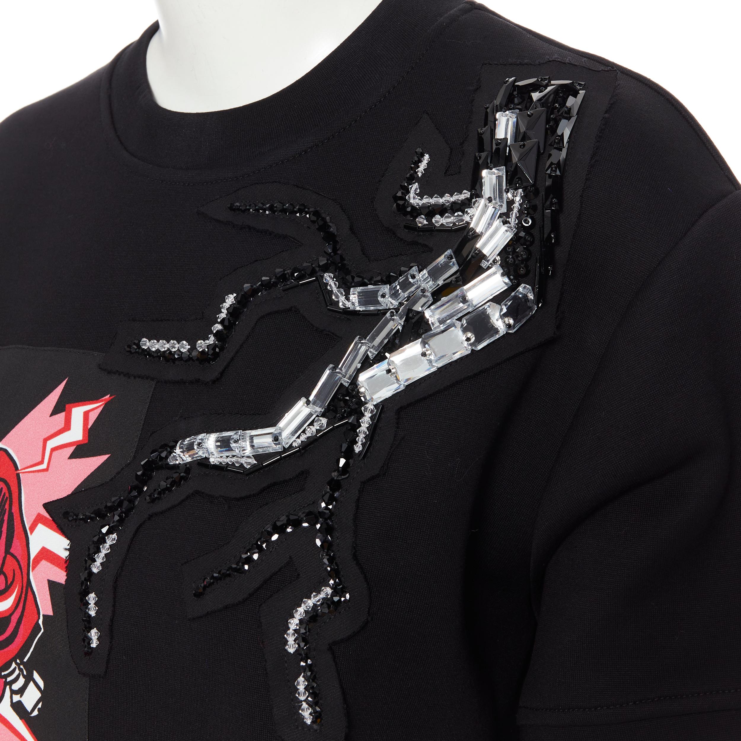 new PRADA 2019 Frankenstein pink rose patch crystal embellished boxy sweater S 
Reference: TGAS/B00412 
Brand: Prada 
Designer: Miuccia Prada 
Collection: Fall Winter 2019 
Material: Cotton 
Color: Black 
Pattern: Floral 
Extra Detail: Frankenstein
