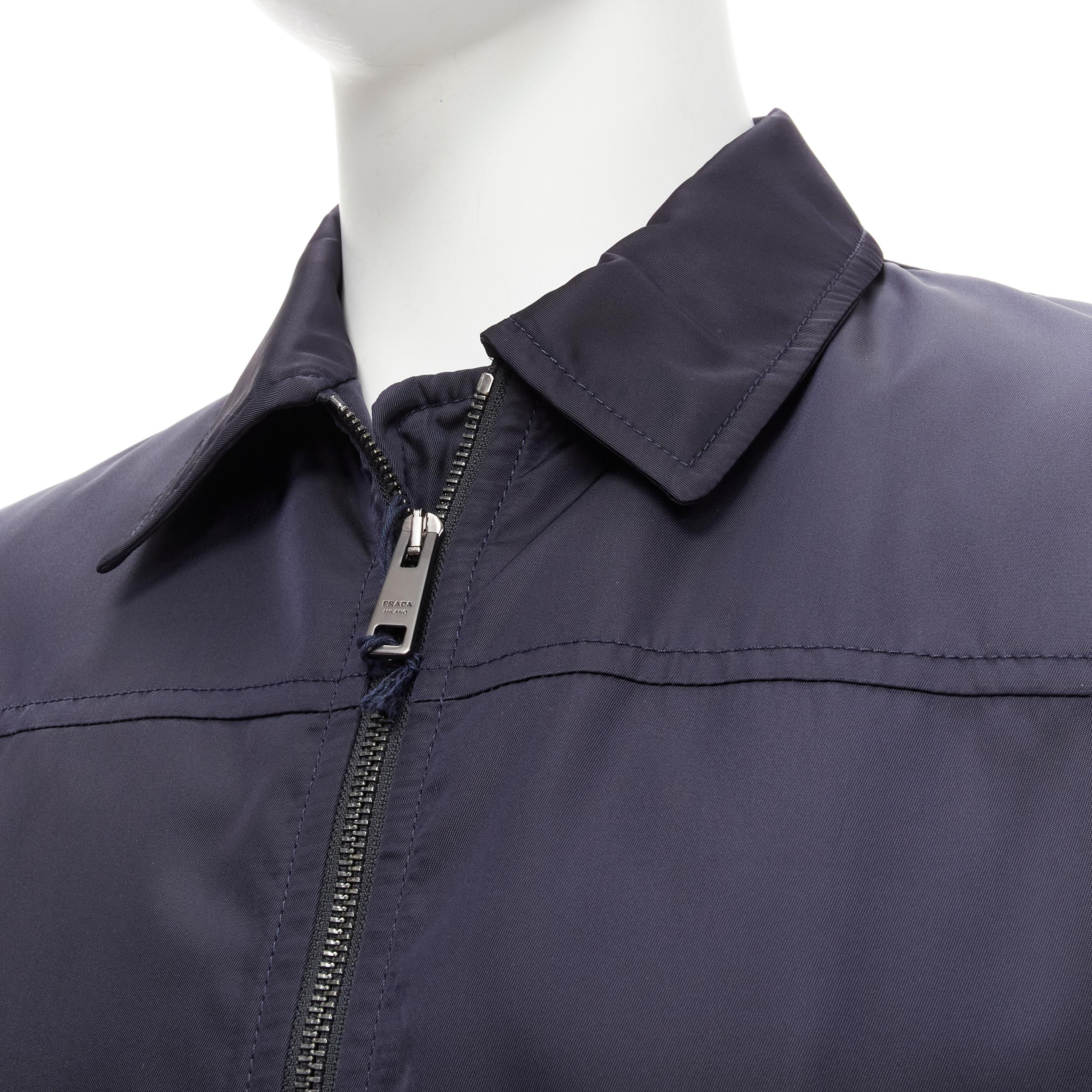 new PRADA 2019 navy blue nylon zip front dual pocket minimal jacket IT46 S
Reference: TGAS/D00155
Brand: Prada
Designer: Miuccia Prada
Collection: 2019
Material: Nylon
Color: Navy
Pattern: Solid
Closure: Zip
Lining: Black Fabric
Extra Details:
