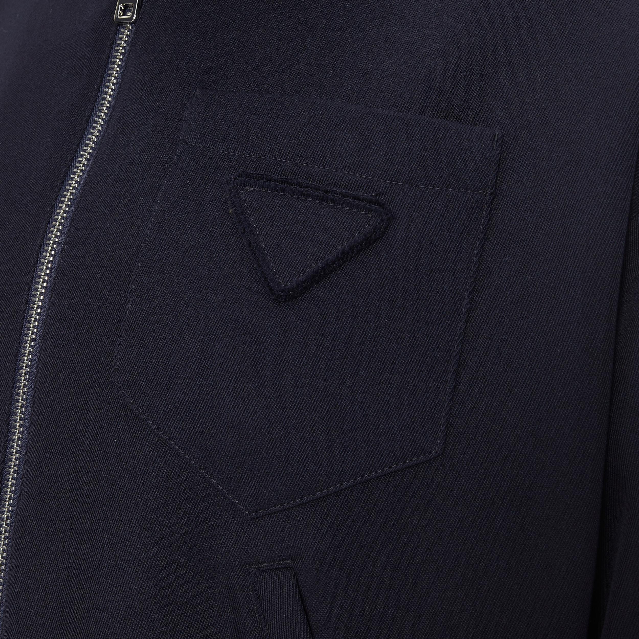 new PRADA 2019 navy blue wool triangle logo pocket cropped zip up hoodie jacket L
Reference: TGAS/B00478
Brand: Prada
Designer: Miuccia Prada
Collection: 2019 
Material: Cotton
Color: Navy
Pattern: Solid
Closure: Zip
Extra Detail: Cotton twill.