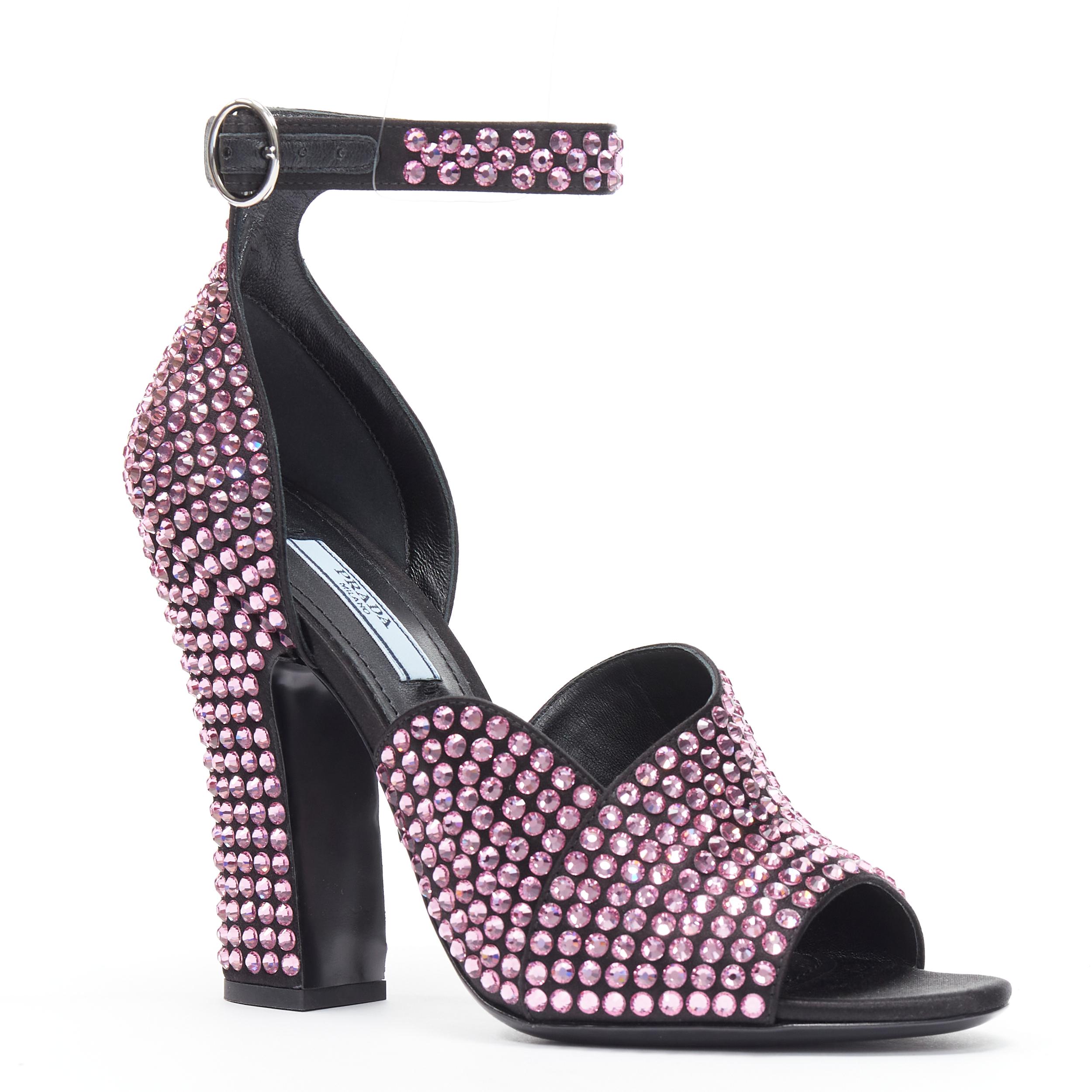 new PRADA 2019 Runway pink crystal rhinestone encrusted high heel sandal EU38 
Reference: TGAS/B01289 
Brand: Prada 
Designer: Miuccia Prada 
Model: Crystal high heel pink 
Collection: Fall Winter 2019 Runway 
Material: Silk 
Color: Pink Pattern: