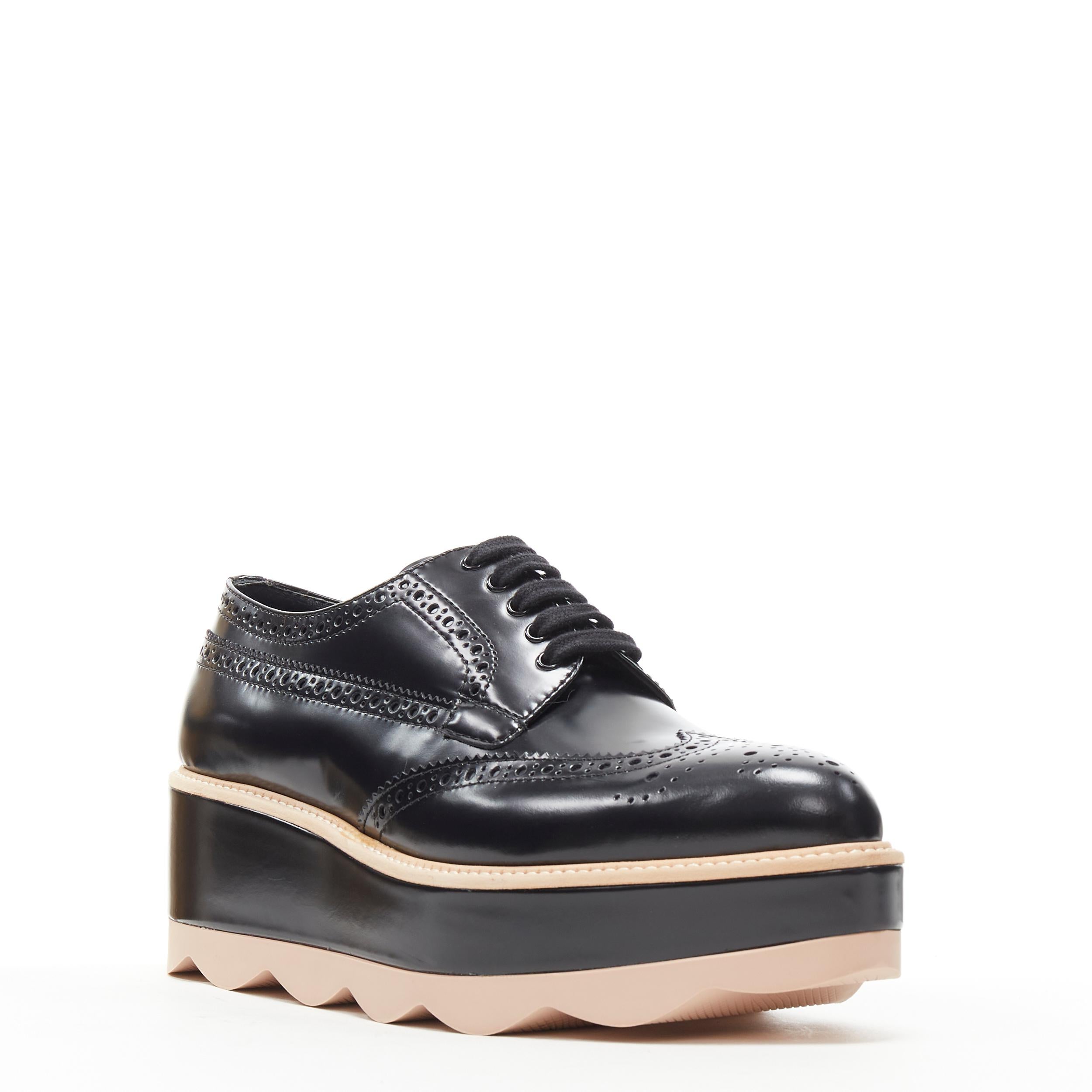 new PRADA black leather platform wedge perforated brogue derby shoe EU38.5 
Reference: TGAS/B00777 
Brand: Prada 
Designer: Miuccia Prada 
Model: Platform brogue black 
Collection: 2016 
Material: Leather 
Color: Black 
Pattern: Solid 
Closure: Lace