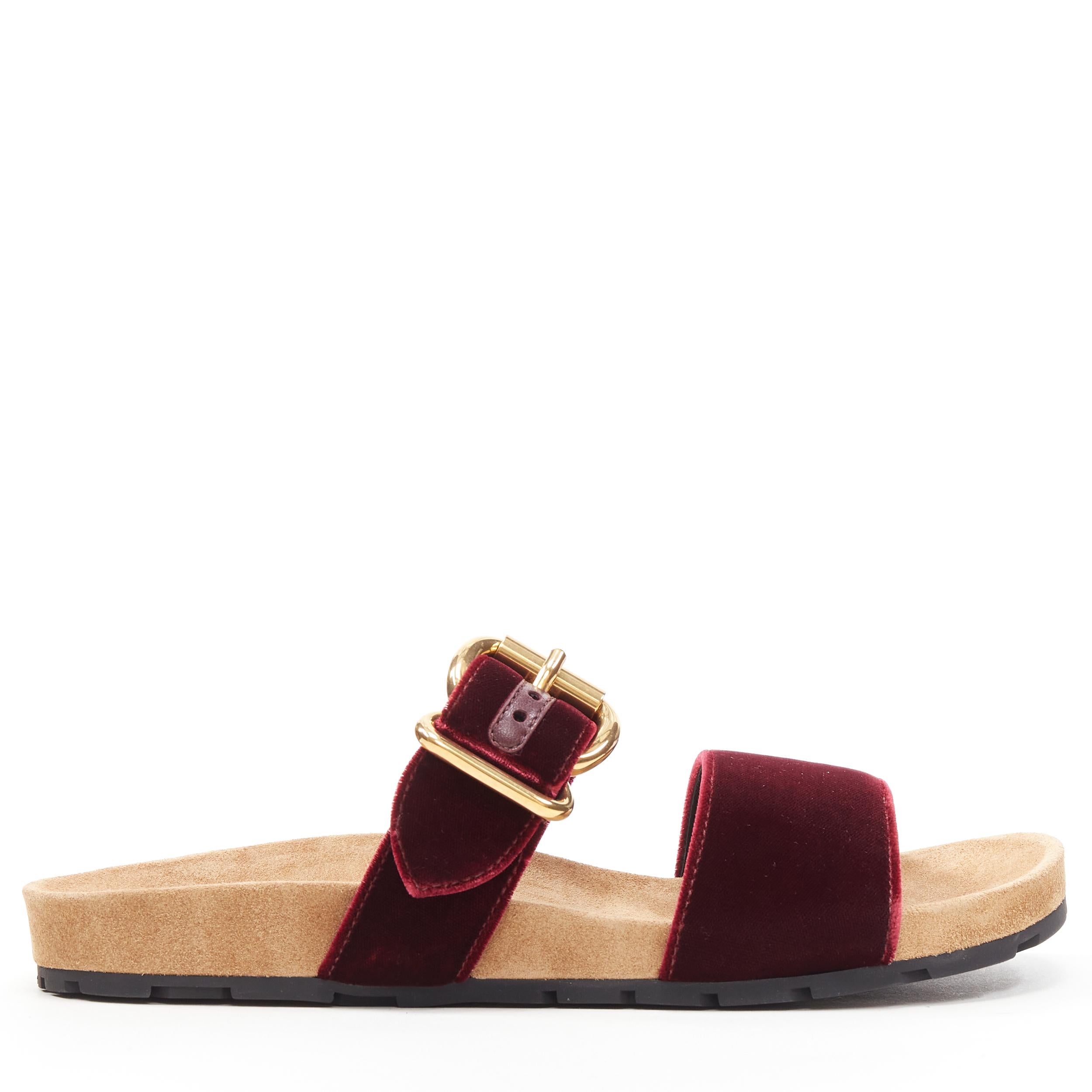 new PRADA burgundy red velvet strap gold buckle slides summer sandals EU37.5 
Reference: TGAS/B00445 
Brand: Prada 
Designer: Miuccia Prada 
Model: Velvet slides 
Material: Velvet 
Color: Burgundy 
Pattern: Solid 
Closure: Buckle 
Extra Detail: