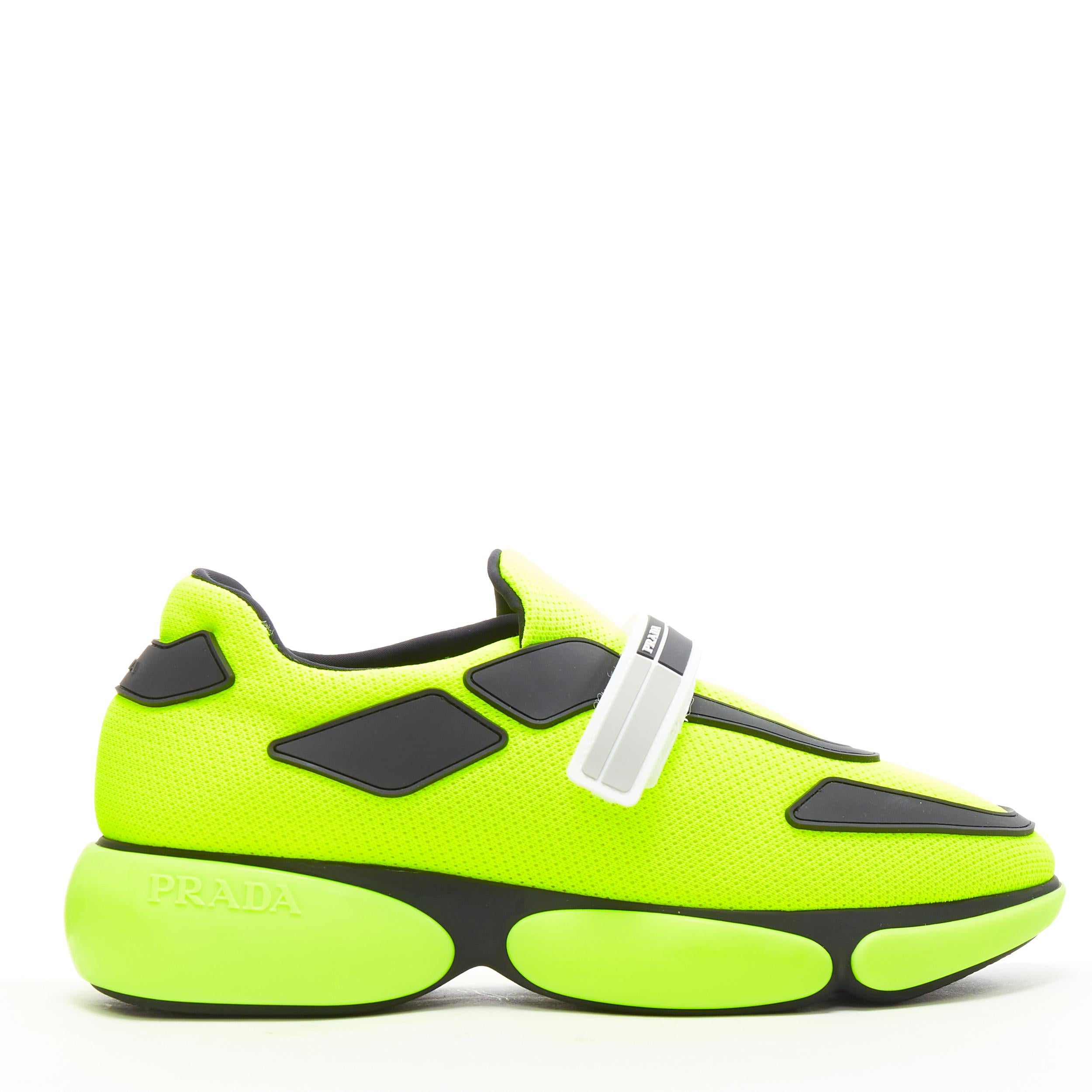 new PRADA Cloudbust neon yellow black logo strap low top sneakers EU36 US6 
Reference: TGAS/B00851 
Brand: Prada 
Designer: Miuccia Prada 
Model: Cloudbust 
Collection: 2018 
Material: Fabric 
Color: Yellow 
Pattern: Solid 
Closure: Magic Tape