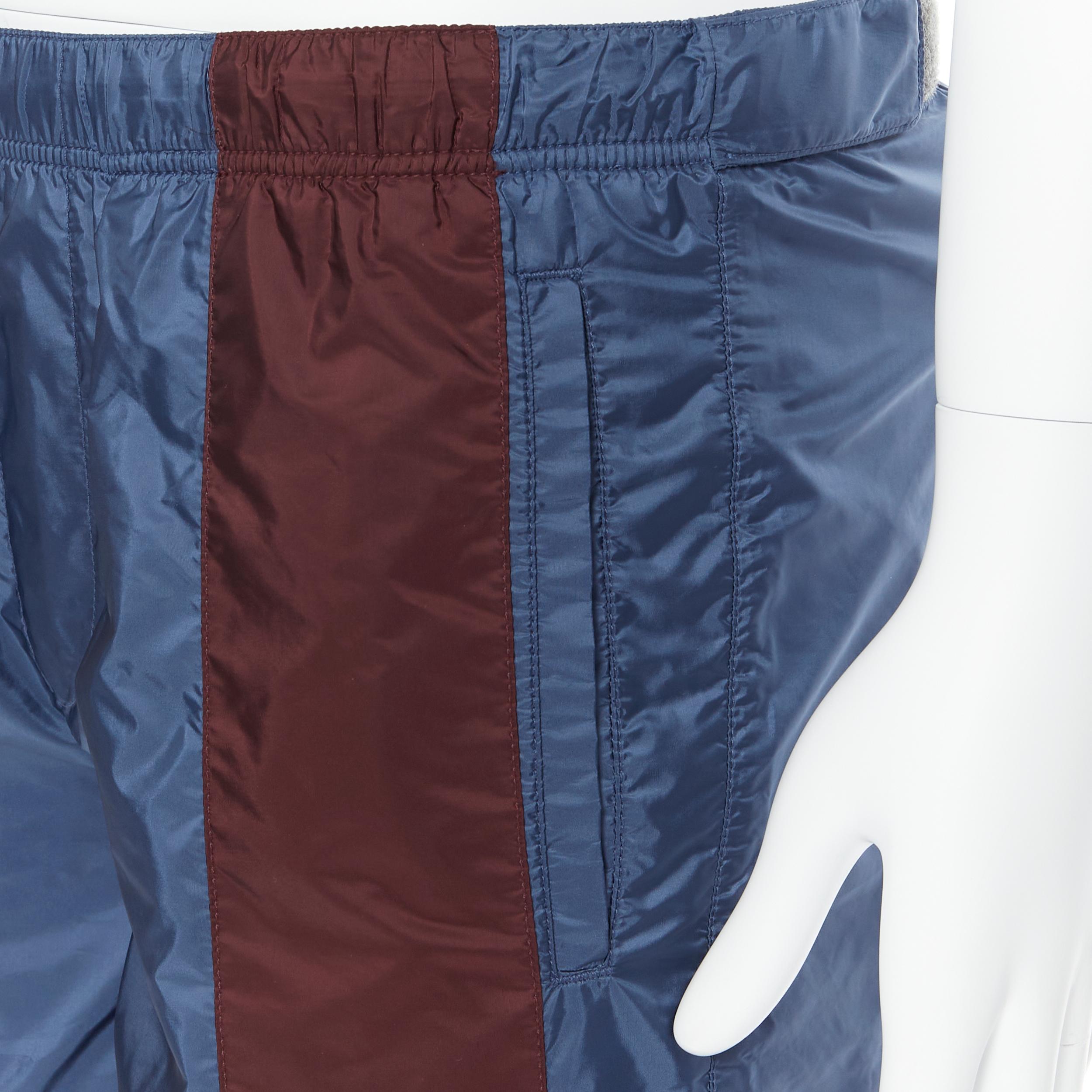 Men's new PRADA dark blue burgundy stripe rubber logo swim shorts trunks IT44 XS For Sale