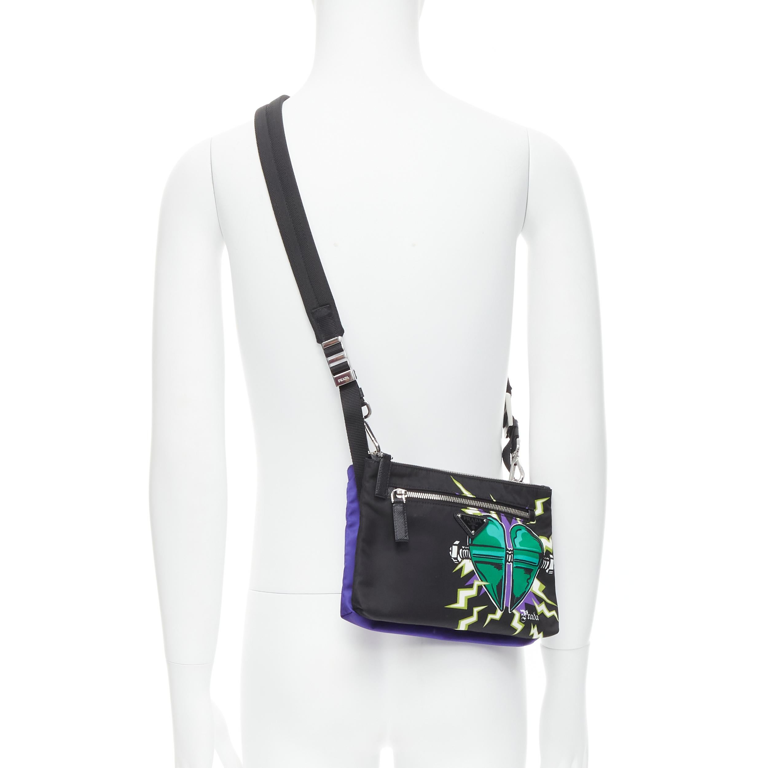new PRADA Frankenstein Heart Tessuto black nylon logo dual pouch crossbody bag 
Reference: TGAS/B01614 
Brand: Prada 
Designer: Miuccia Prada 
Model: Frankenstein dual pouch crossbody 
Material: Nylon 
Color: Black 
Pattern: Solid 
Closure: Zip