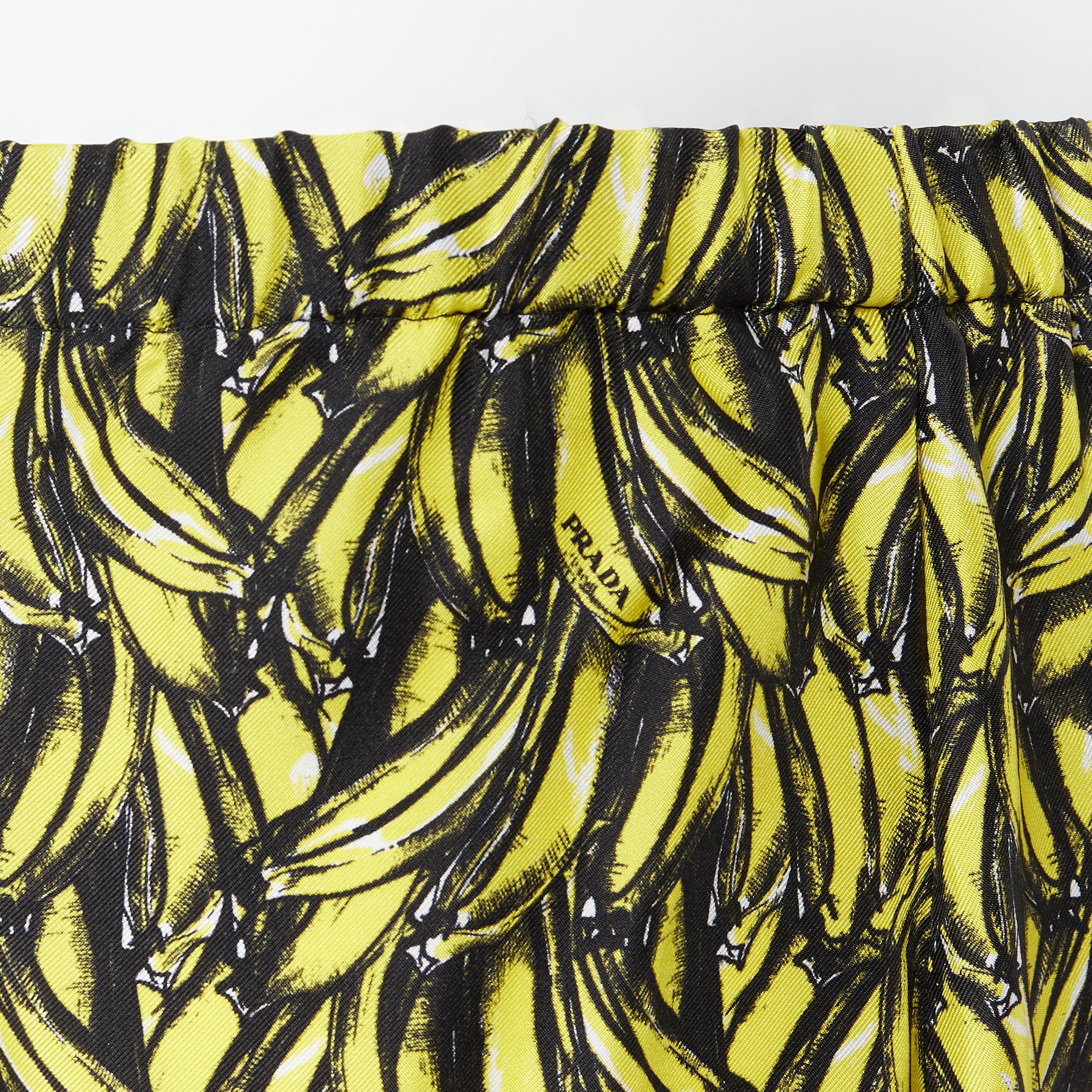 new PRADA iconic banana print 100% silk elasticated waist boxer shorts S 
Reference: TGAS/B00388 
Brand: Prada 
Designer: Miuccia Prada 
Material: Silk 
Color: Yellow 
Pattern: Other 
Closure: Button 
Extra Detail: Elasticated waist. Button fly