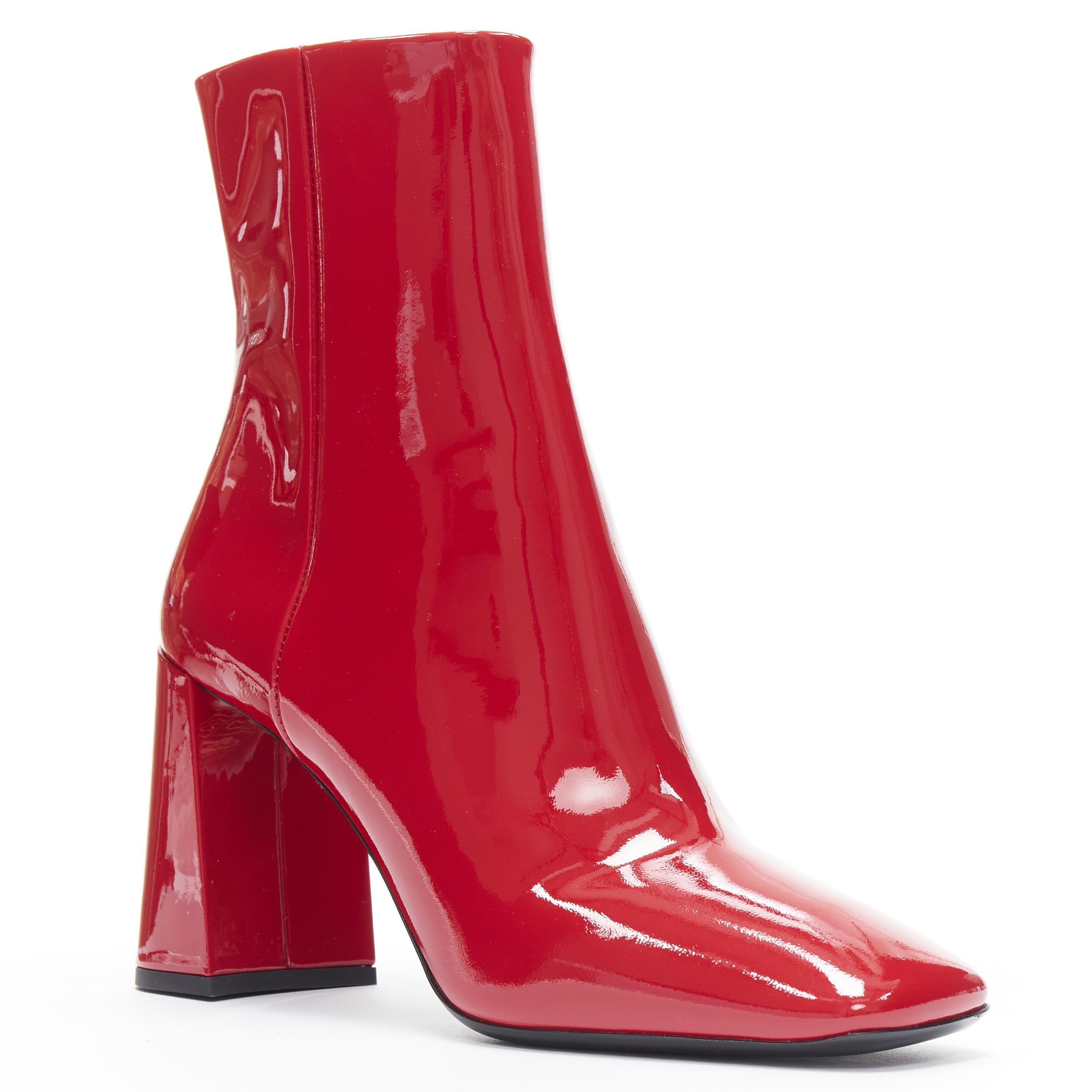 new PRADA lipstick red patent square toe chunky heel ankle boot EU35 
Reference: TGAS/B01295 
Brand: Prada 
Designer: Miuccia Prada 
Model: Red patent boot 
Material: Patent Leather 
Color: Red 
Pattern: Solid 
Closure: Zip 
Extra Detail: Square