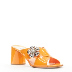 new PRADA neon orange patent cross strap silver flower brooch mule mid heel EU37