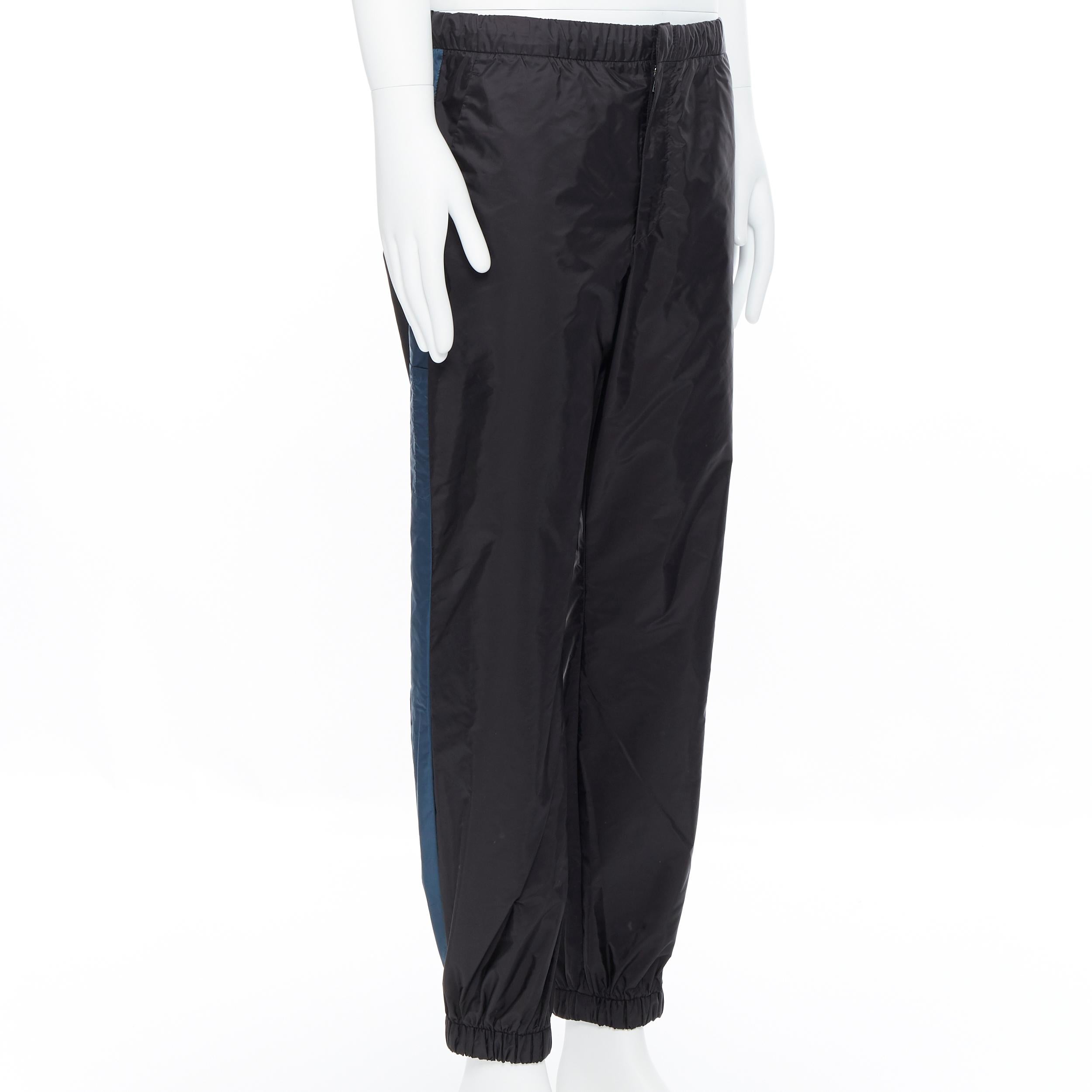 new PRADA Nylon 2018 black blue side stripe toggle gabardine track pants L  For Sale at 1stDibs