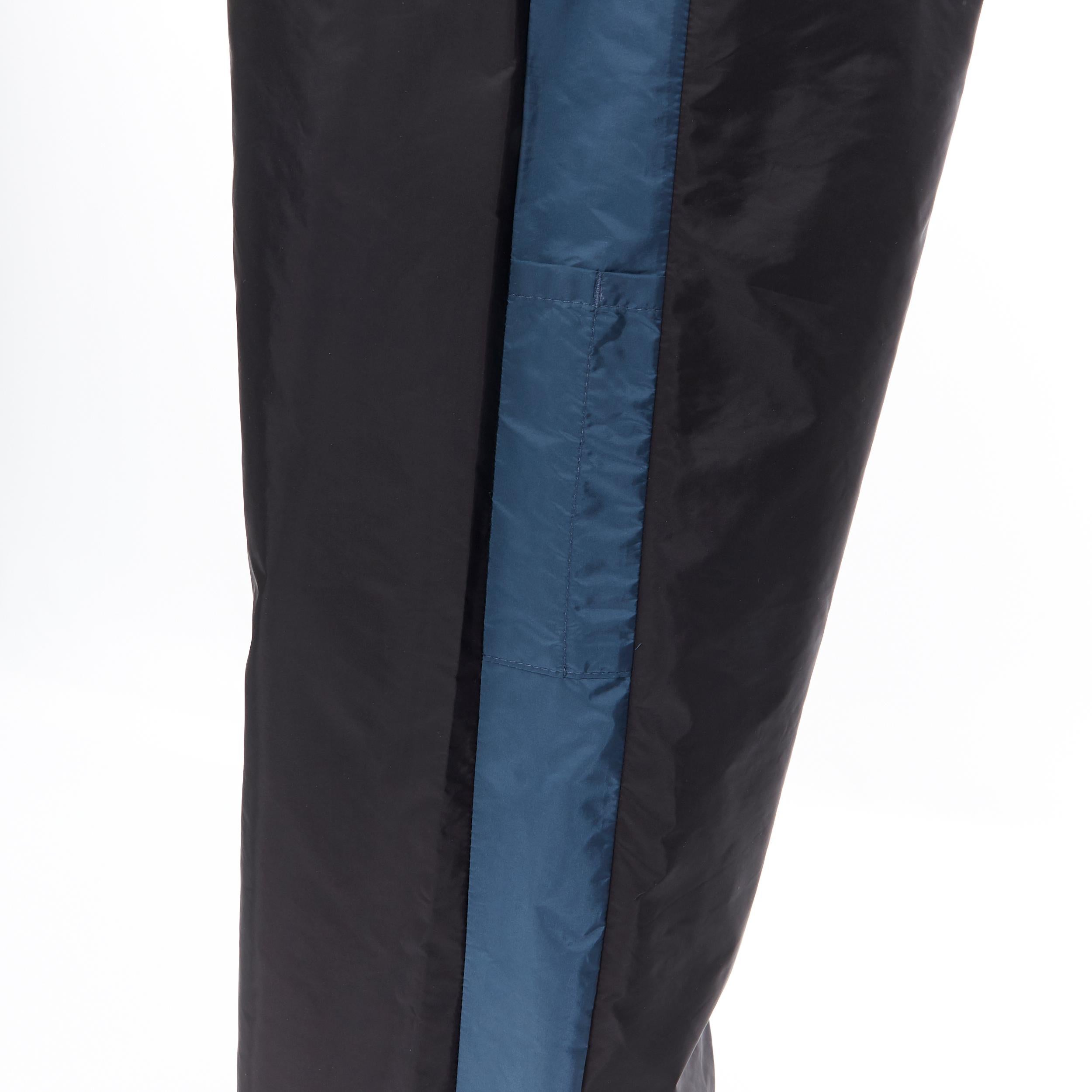 Women's new PRADA Nylon 2018 black blue side stripe toggle gabardine track pants L For Sale