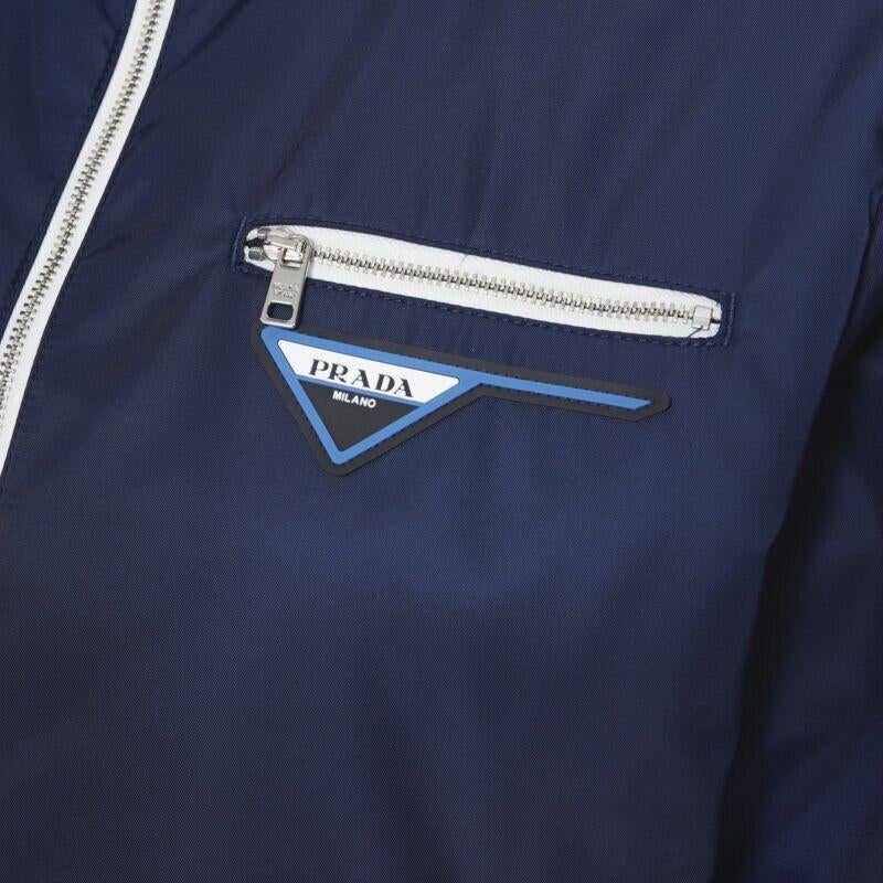 new PRADA Nylon 2018 blue triangle rubber logo zip front bomber jacket IT40 S
Reference: TGAS/A05706
Brand: Prada
Designer: Miuccia Prada
Model: 