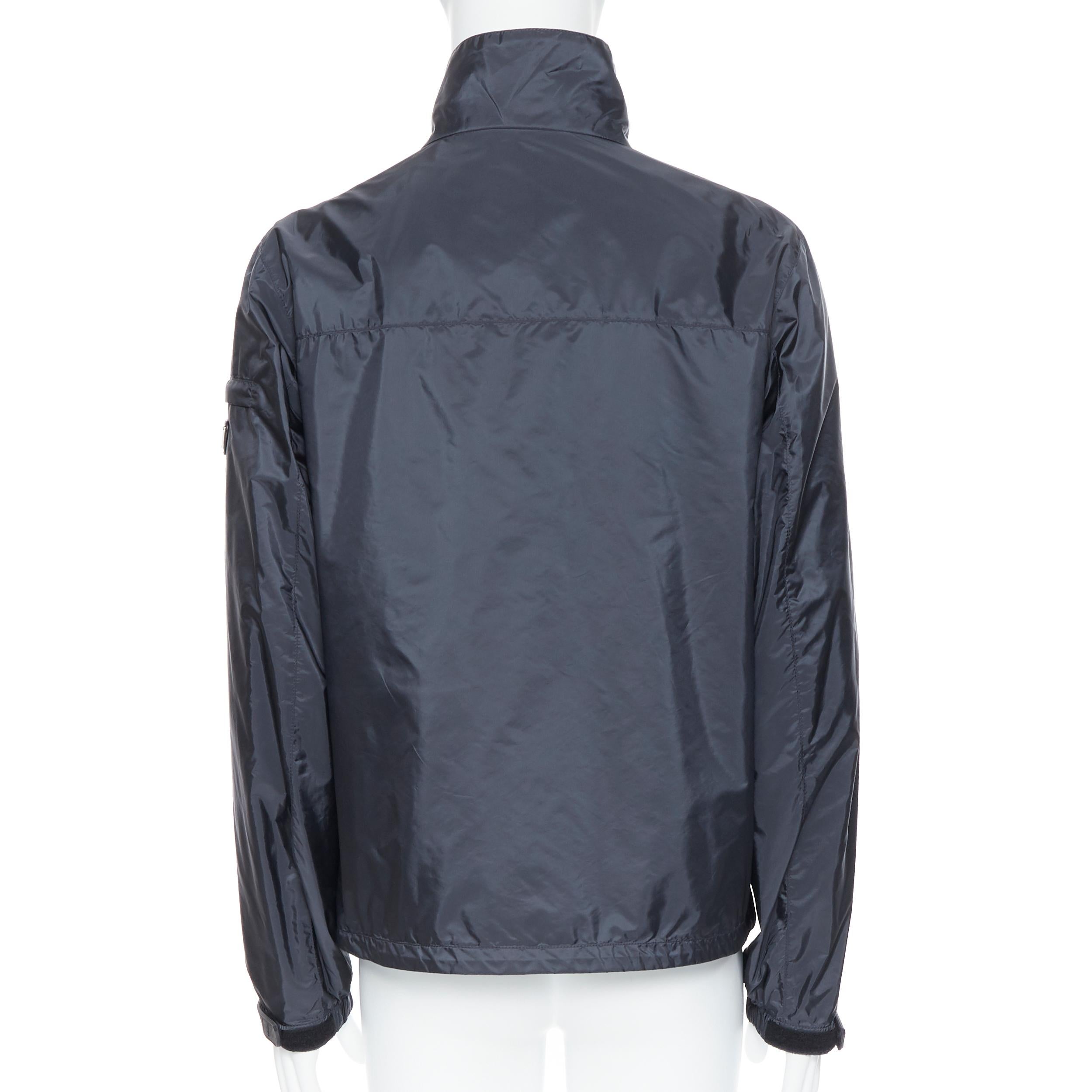 nuevo PRADA Nylon 2018 azul marino esmalte triángulo logotipo de goma puño cremallera shell chaqueta IT54 2