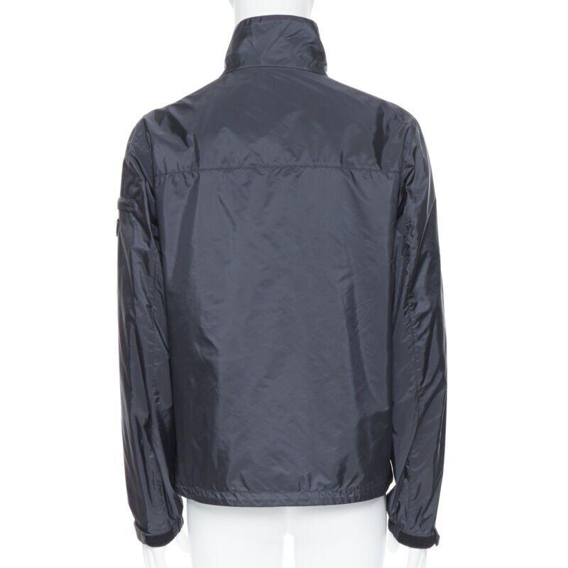 new PRADA Nylon 2018 navy enamel triangle rubber logo cuff zip shell jacket IT54 For Sale 2