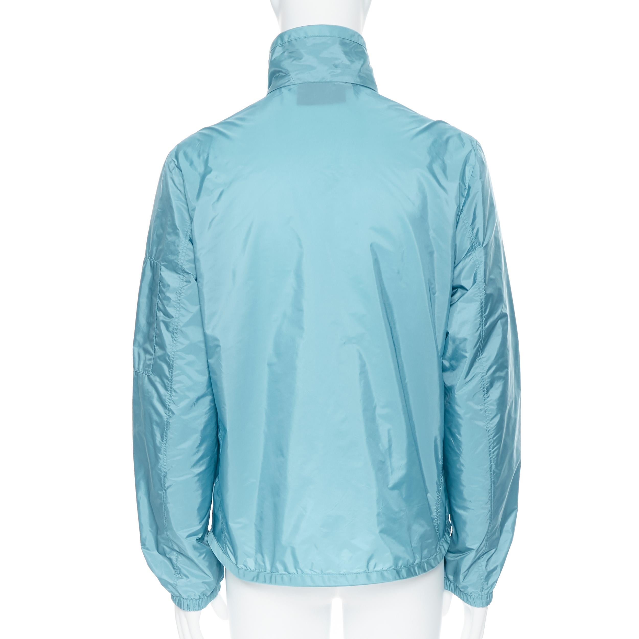 Blue new PRADA Nylon teal blue rubber logo badge zip front light shell jacket IT50