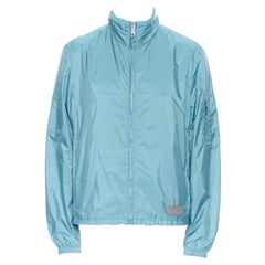new PRADA Nylon teal blue rubber logo badge zip front light shell jacket IT50