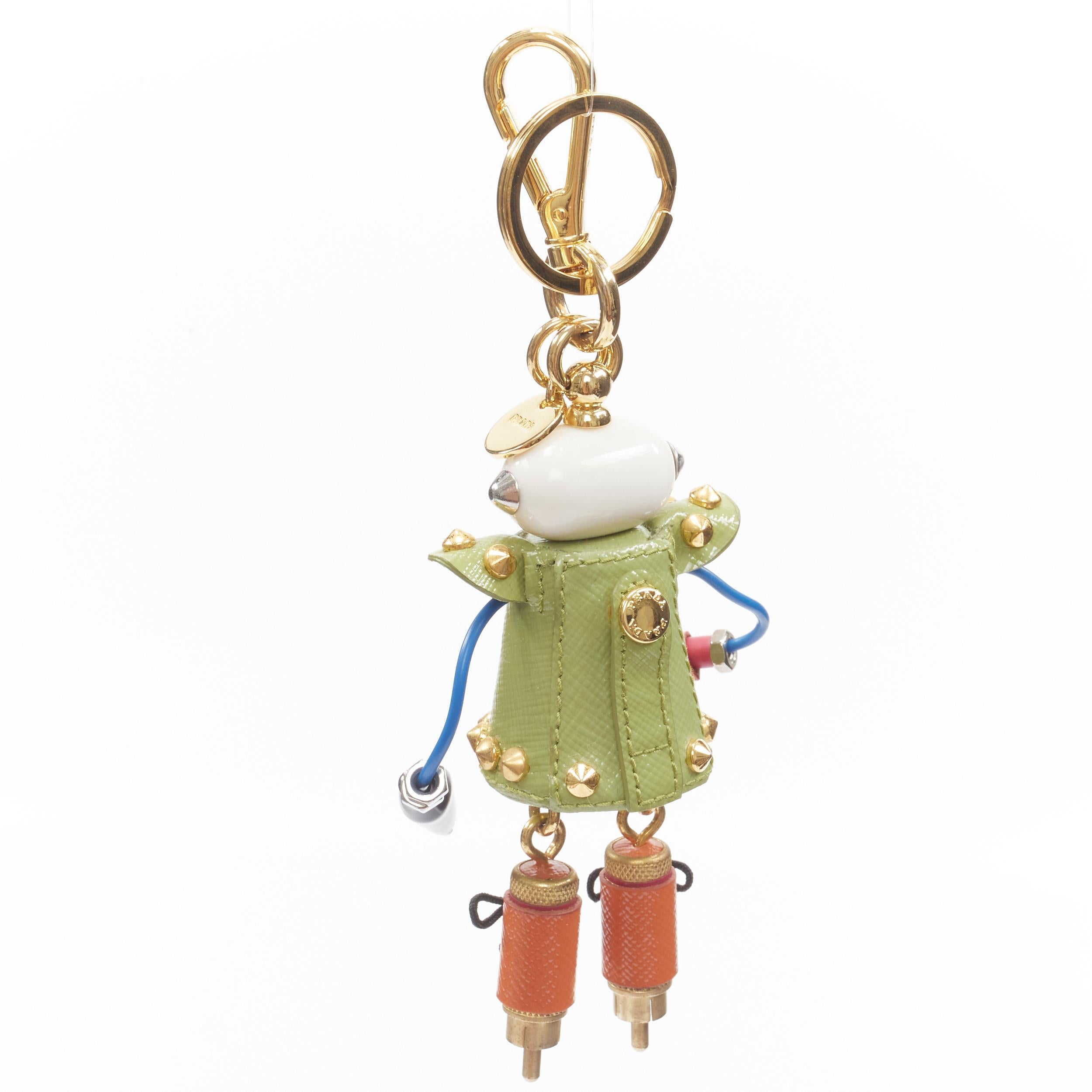new PRADA Robot heart lips green studded hardware bolt keychain bag charm 
Reference: TGAS/B01000 
Brand: Prada 
Designer: Miuccia Prada 
Material: Leather 
Color: Green 
Pattern: Solid 
Closure: Clasp 
Extra Detail: Pearl head saffiano leather
