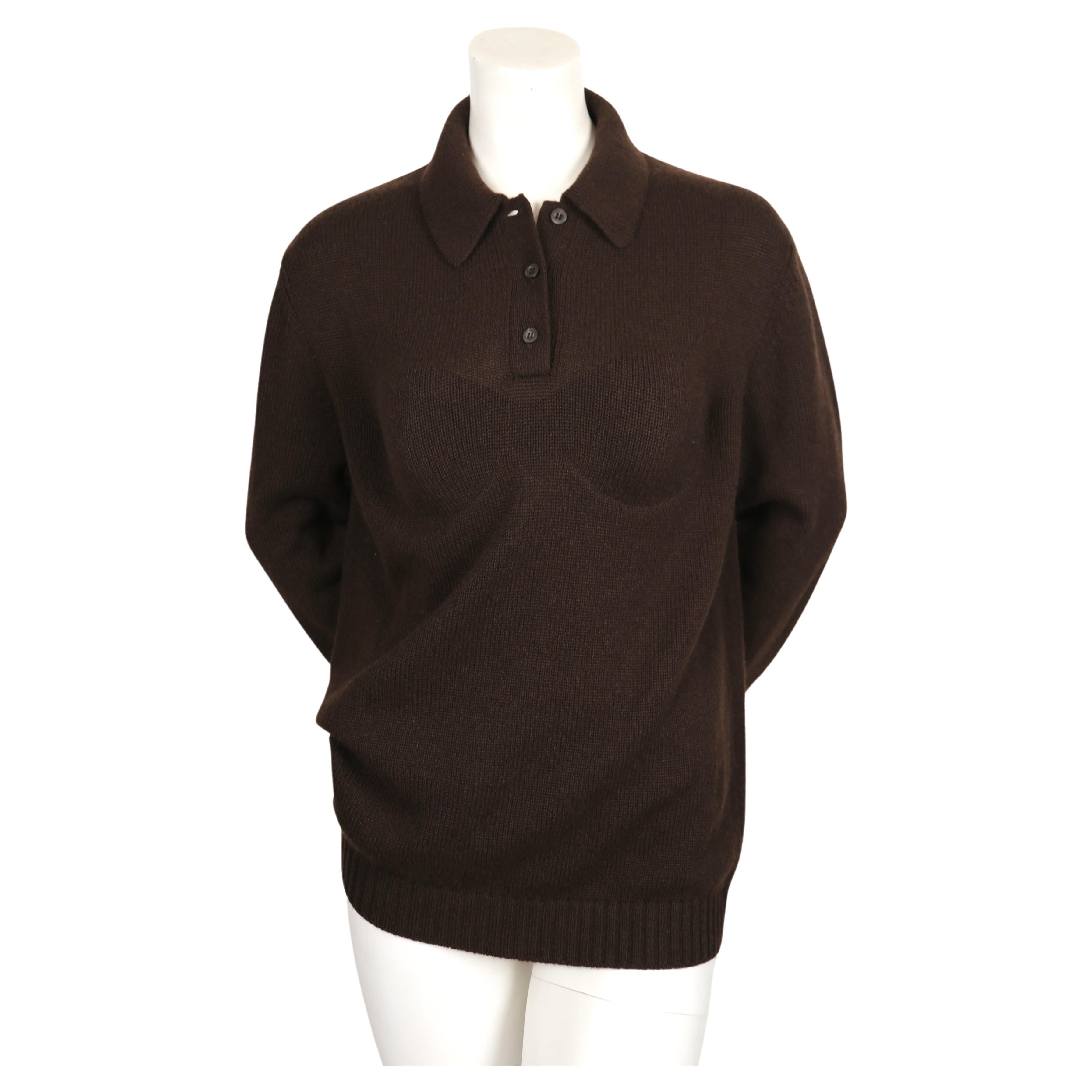 Deep brown cashmere polo sweater with integrated bra designed by Miuccia Prada and Raf Simons exactly as seen on the spring 2022 runway. Labeled a size 'M' although it can easily fit a XS (size of mannequin) or S. Approximate measurements of