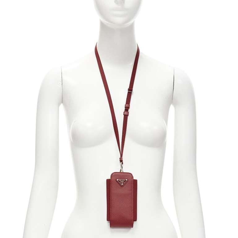 new PRADA Symbole Triangle logo saffiano leather phone pouch lanyard bag red
Reference: TGAS/C01602
Brand: Prada
Designer: Miuccia Prada
Material: Leather, Nylon
Color: Red
Pattern: Solid
Closure: Elasticated
Extra Details: This will fit various