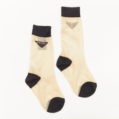 new PRADA Triangle logo beige semi sheer black trimmed fine cotton knit socks