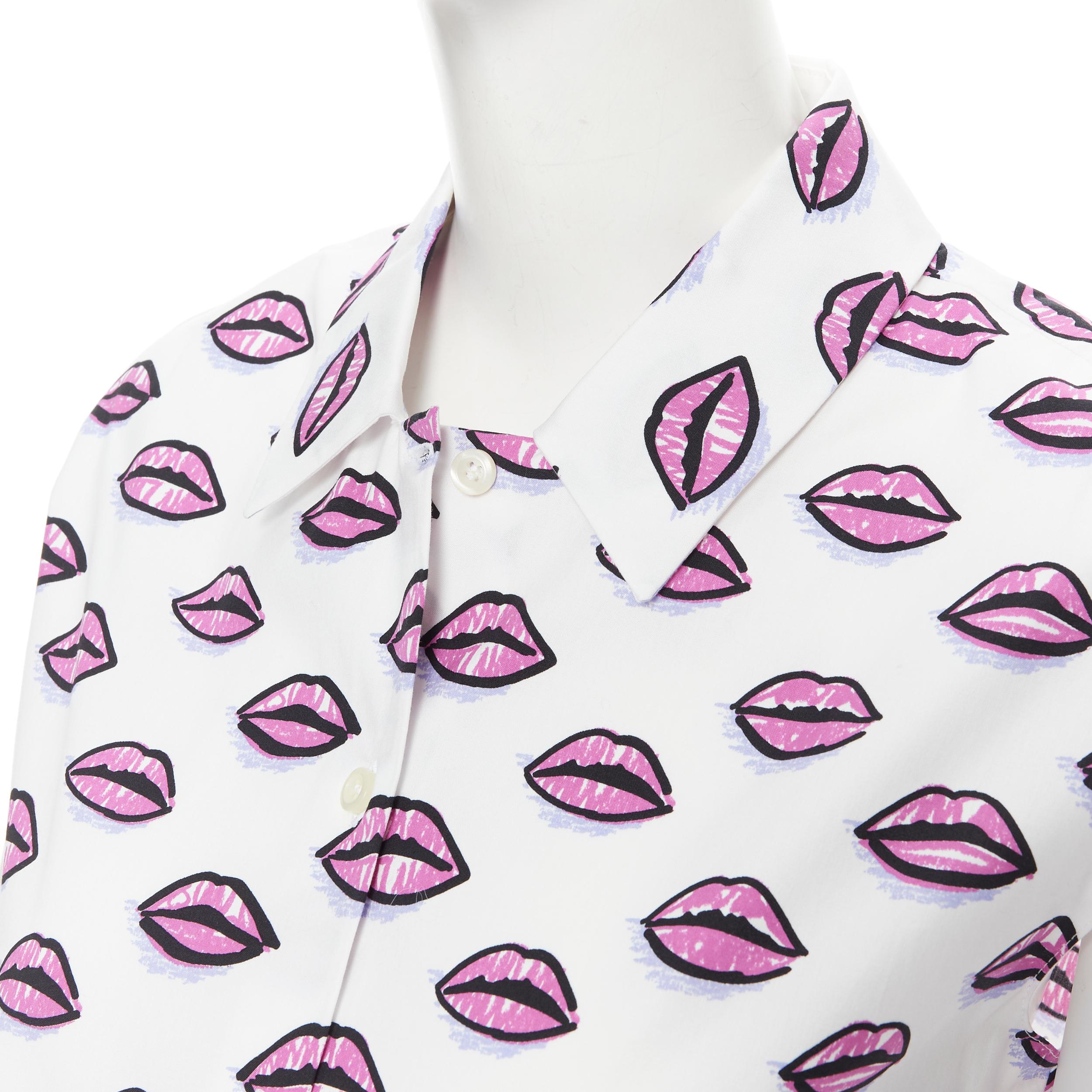 new PRADA white cotton kiss lip print sleeveless cotton shirt IT40 S 
Reference: TGAS/B00482 
Brand: Prada 
Designer: Miuccia Prada 
Collection: 2019 
Material: Cotton 
Color: White 
Pattern: Abstract 
Estimated Retail Price: US $650 
Made in: