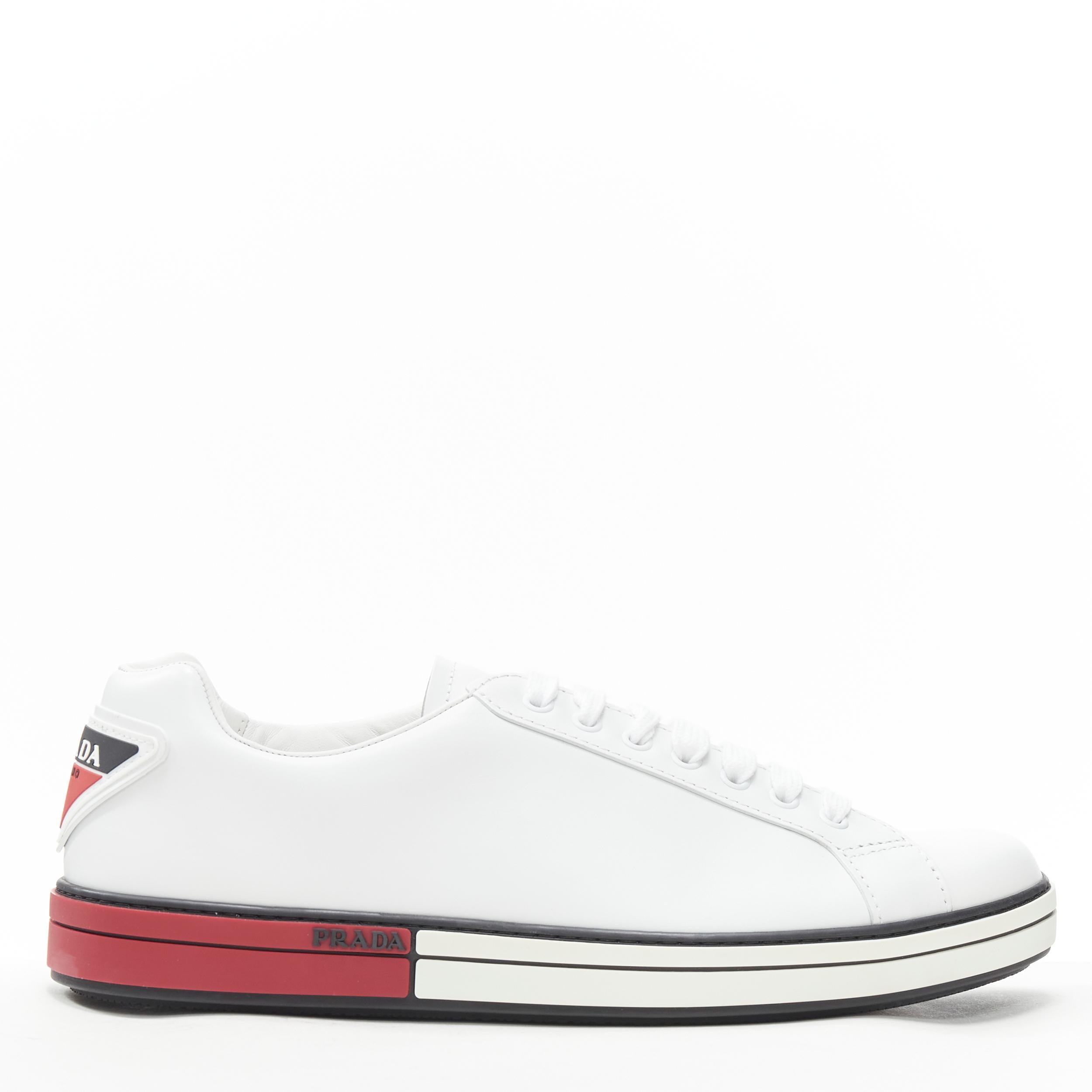 new PRADA white leather triangle logo red white midsole low sneaker UK11 Reference: TGAS/B00914 
Brand: Prada 
Designer: Miuccia Prada 
Model: White sneaker 
Collection: 2018 
Material: Leather 
Color: White 
Pattern: Solid 
Closure: Strap 
Extra