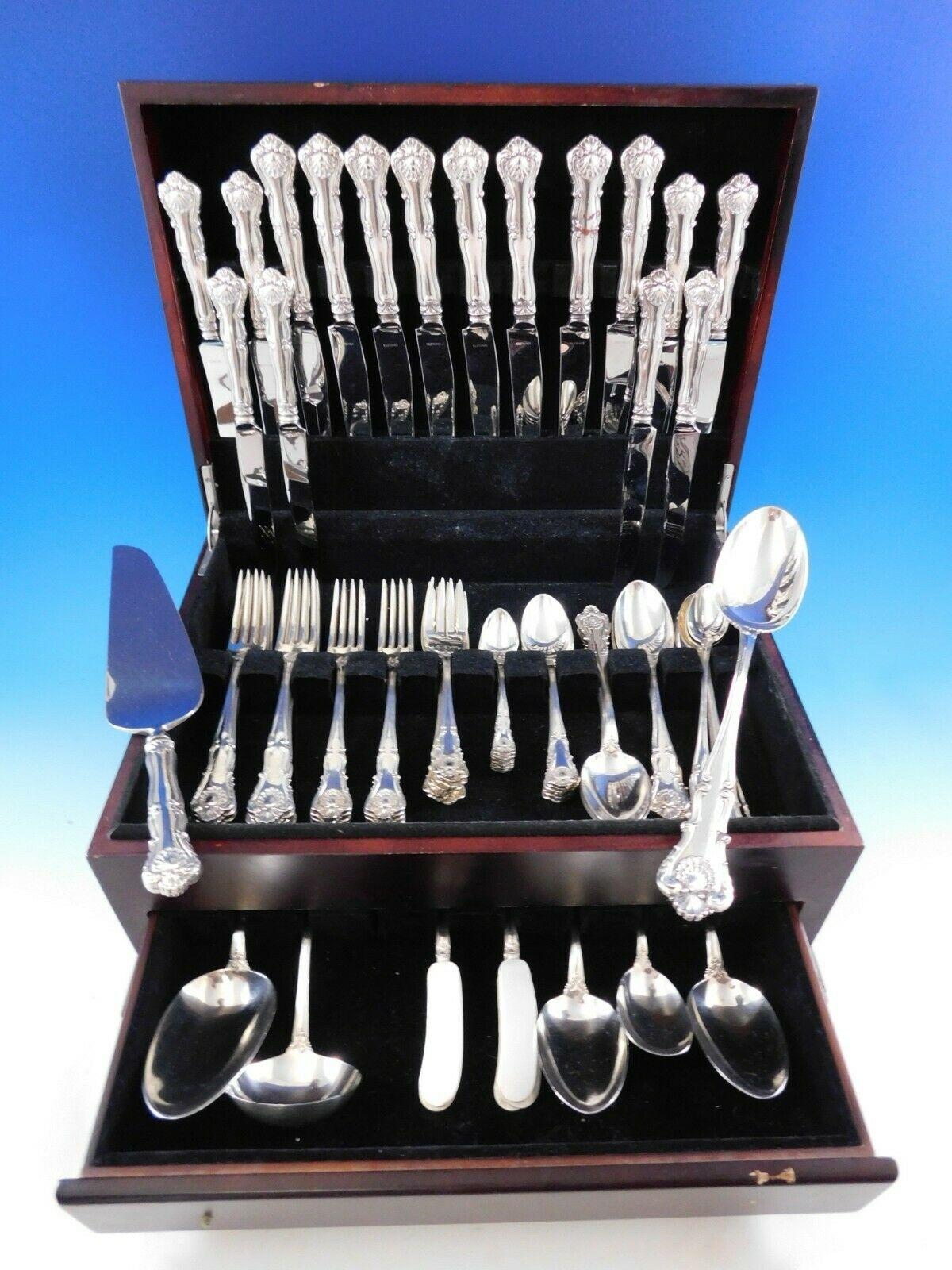 New Queens by Durgin sterling silver dinner flatware set, 87 pieces. This timeless, Classic, shell-motif pattern was introduced in the year 1900. This set includes:

8 dinner size knives, 9 1/2