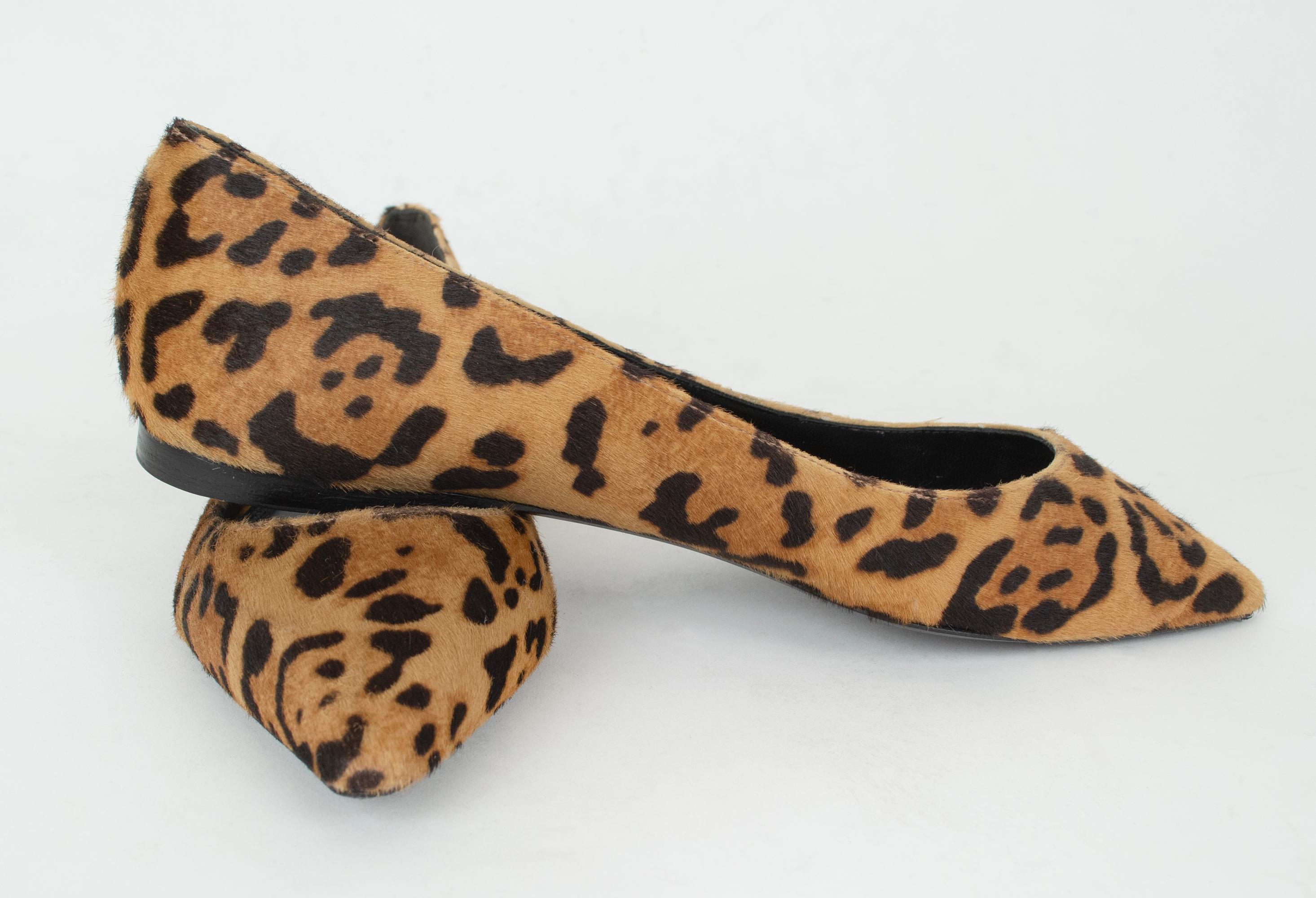 The most sophisticated ballet flat you’ll ever meet. The elegant pointed toe and chic leopard print prove high fashion can also be comfortable.

Brand new pointed flat slides with leopard print calf hair uppers; leather insole and sole. 

material: