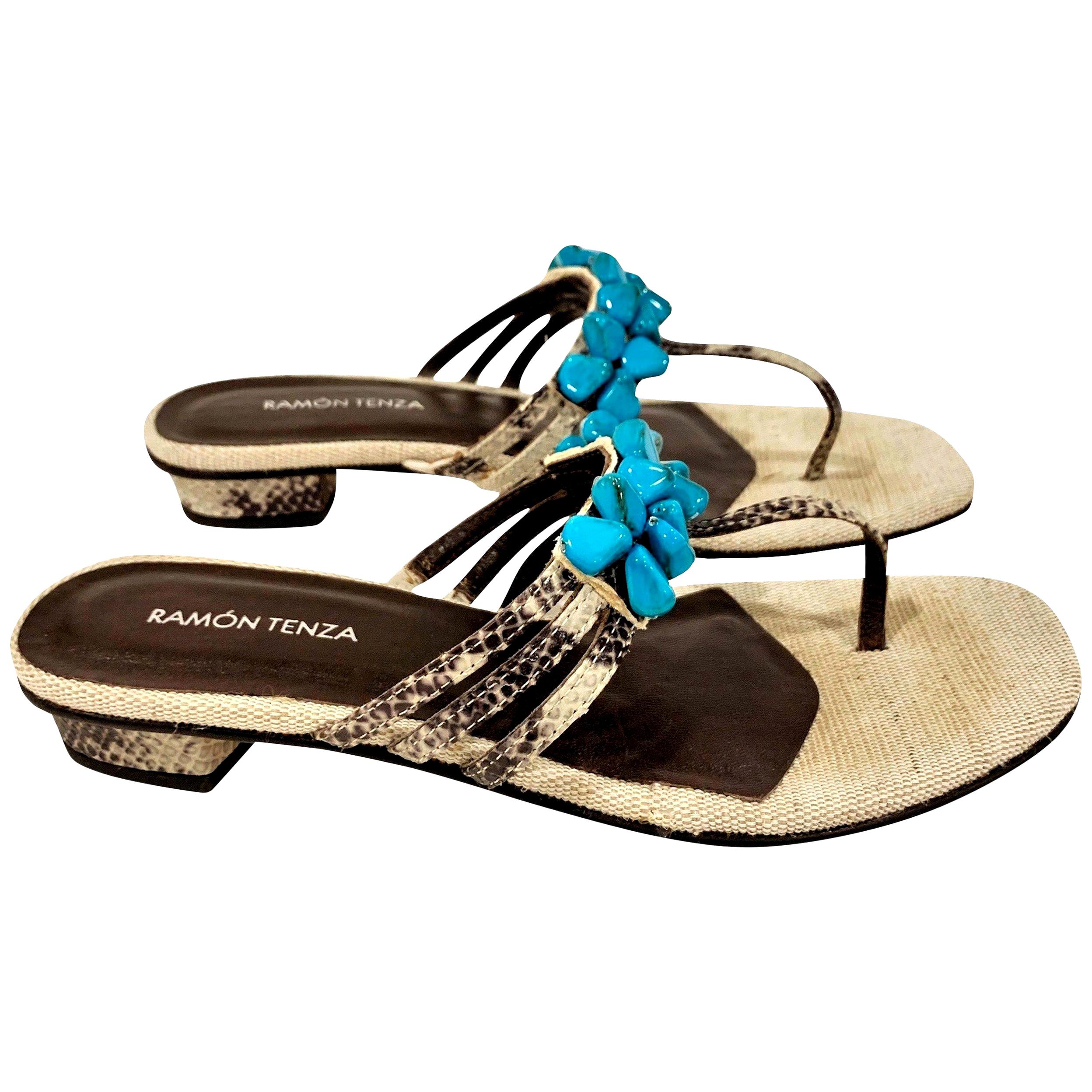 Ramon Tenza Spain
Brand New
Beige & Turquoise Thong Sandals
* Padded Leather Footbed
* Snakeskin Heel & Strap
* Faux Turquoise Beading
* Size: 8
* 1.25