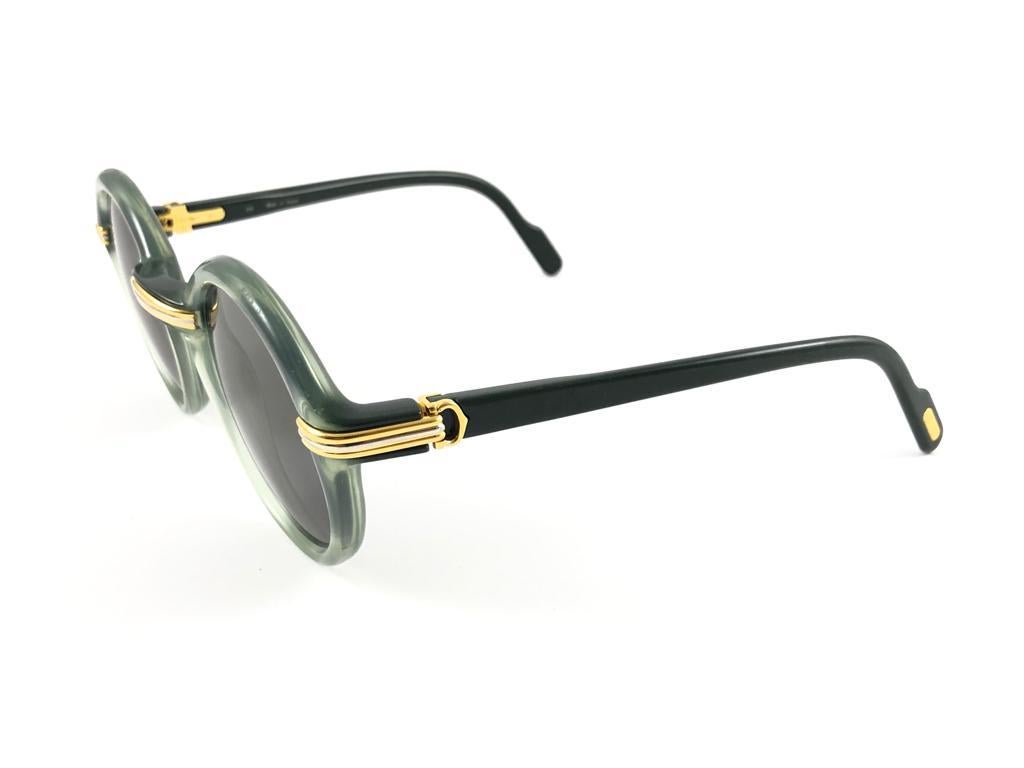 New Rare Cartier Cabriolet Round Jade & Gold 52MM 18K Sunglasses France 1990's In Excellent Condition In Baleares, Baleares