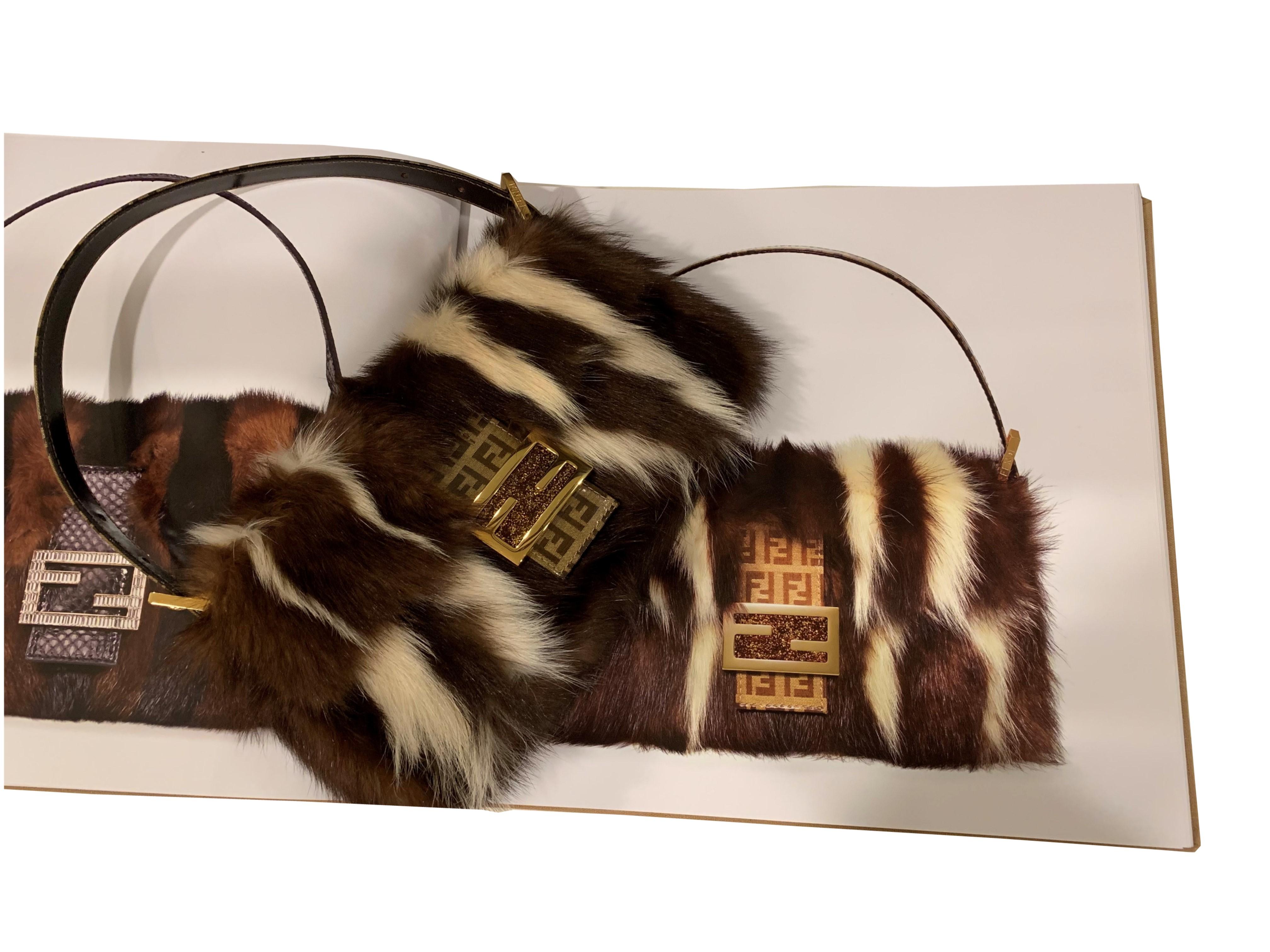 Fendi Fur Baguette
Featured in the Fendi 15th Anniversary Baguette Book
Brand New
* Rare Limited Edition Skunk Fur Baguette
* Brown and Cream Fur
* Gold Hardware
* Deep Purple Satin Lining
* One Interior Zippered Pocket
* Patent Covered Beige &