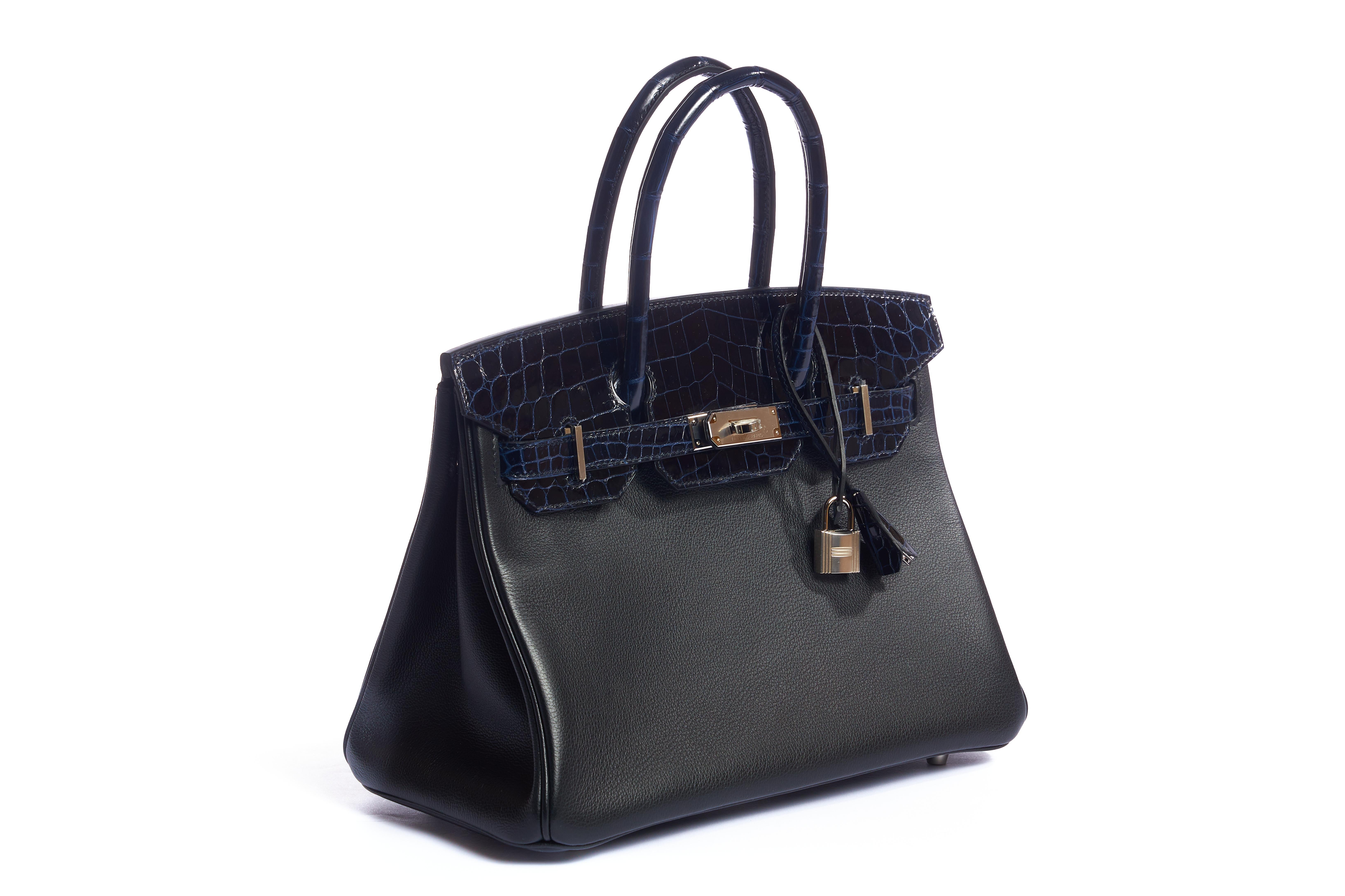 Hermes rare and collectible brand new in box birkin 30 cm. Combination of blue marine niloticus crocodile and black taurillon novillo. Palladium hardware intact with plastic on it. Handle drop 4