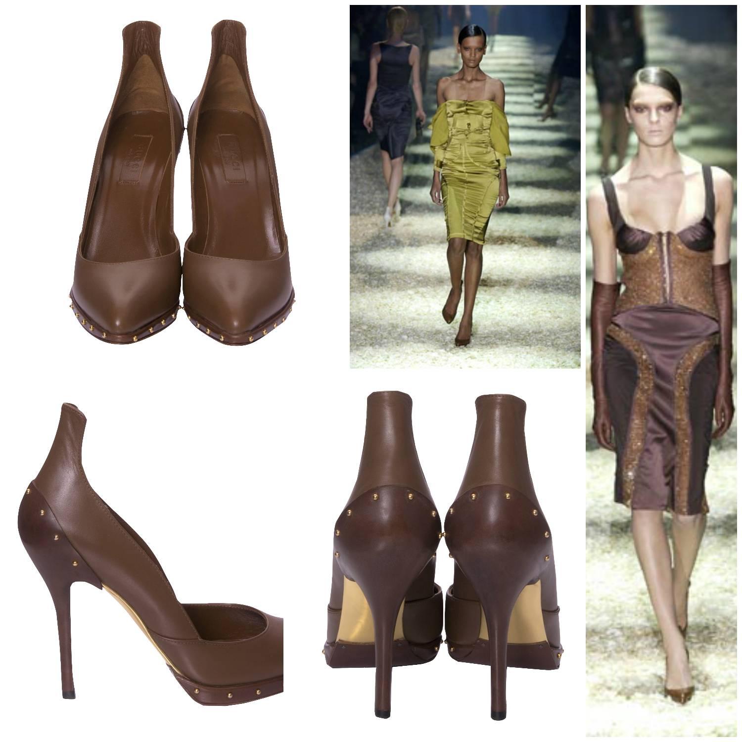 Gucci Tom Ford Heels
Fall 2003
Brand New
Rare Ad/Runway Heels Tom Ford for Gucci Fall 2003
Own a Piece of Fashion History
U.S. Size: 9.5
Brown Leather Pumps
Gold Studded Hardware
4.5