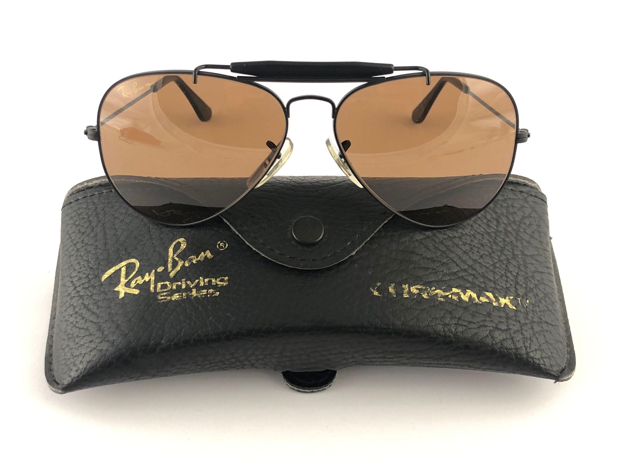 New, rare and sought after Vintage Ray Ban Chromax. 58MM Outdoorsman gold frame holding a pair of Chromax B&L etched lenses.

New, never worn or displayed, this item is a superb find.
It may have minor sign of wear due to storage. 
Comes with its