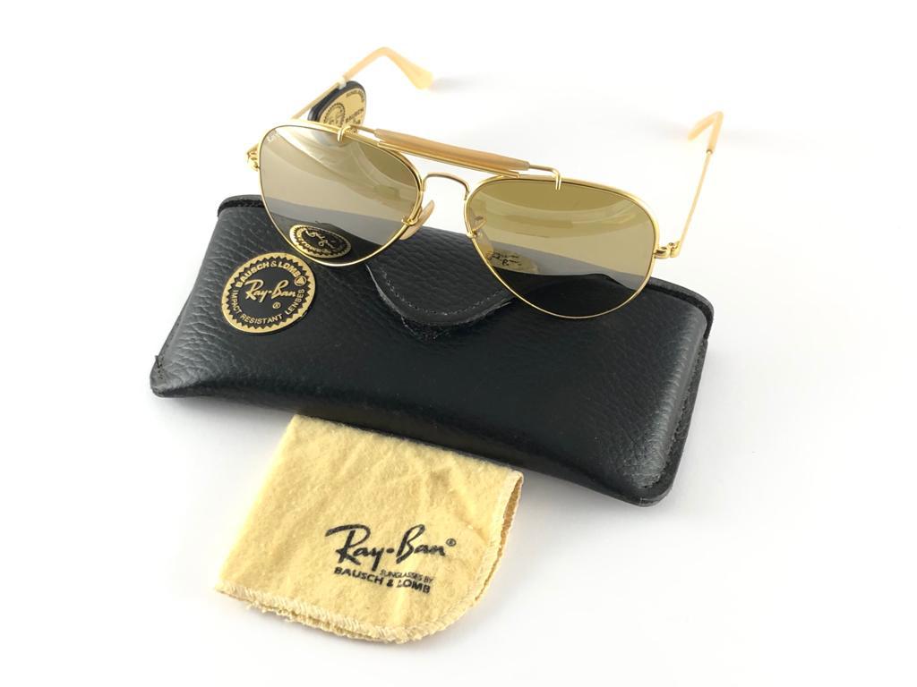New 50th Anniversary Edition 1937-1987 Ray Ban The General Gold Bravura frame with the extra strong temples. RB 50 Ambermatic mirror lenses.
Ray Ban 50 written on the right lens. B&L Ray Ban Usa. Under the bridge 58 [] 14. Comes with original