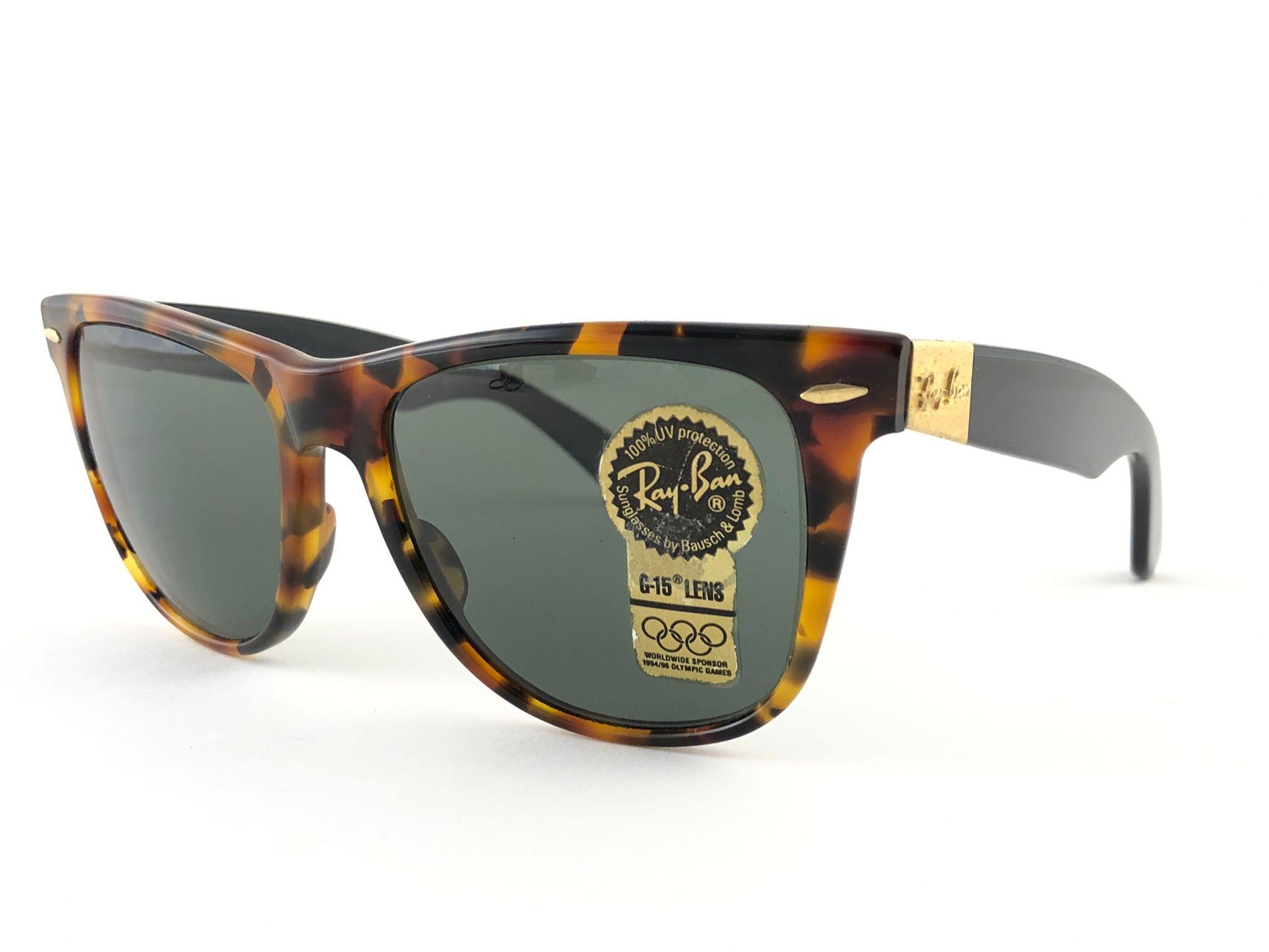 New classic Wayfarer II in tortoise.  B&L etched in both G15 grey lenses. Please notice that this item is nearly 40 years old and could show some storage wear.  New, ever worn or displayed. Made in USA.